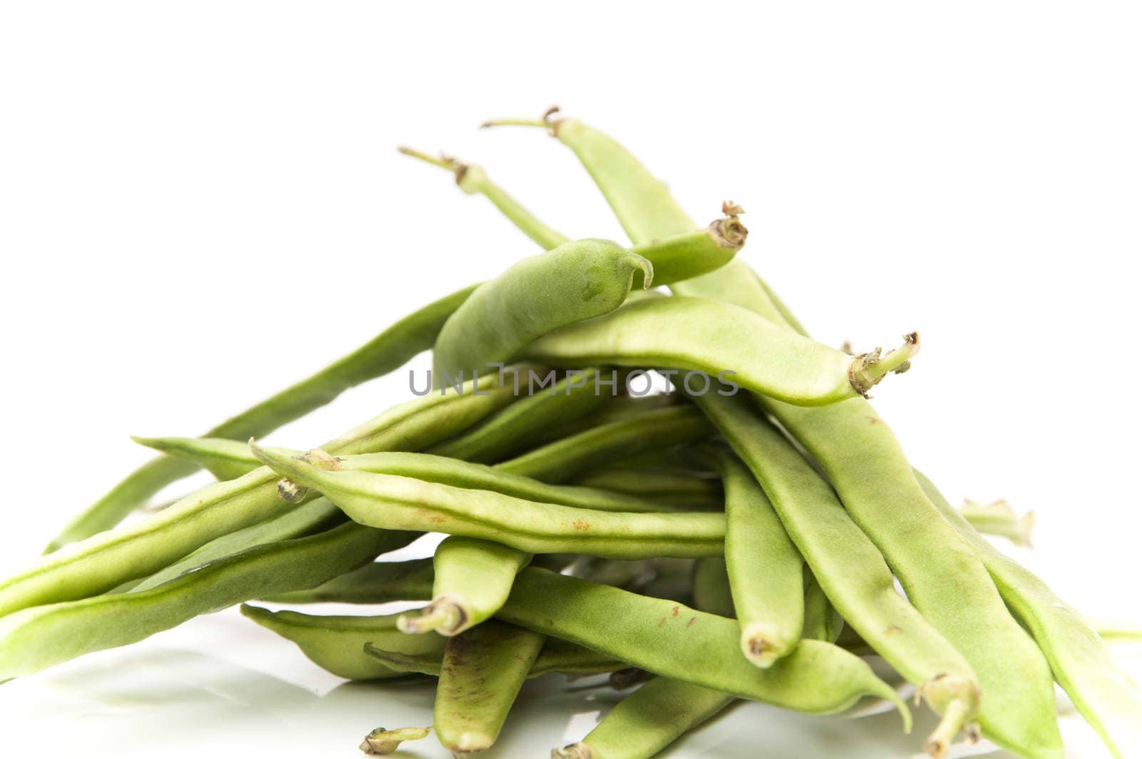 green beans on a white background