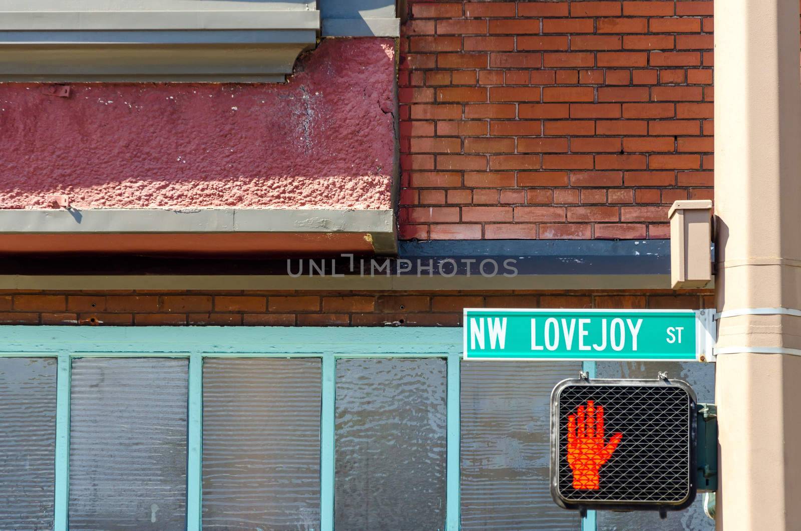 Street corner in Portland, Oregon with a traffic signal showing not to cross