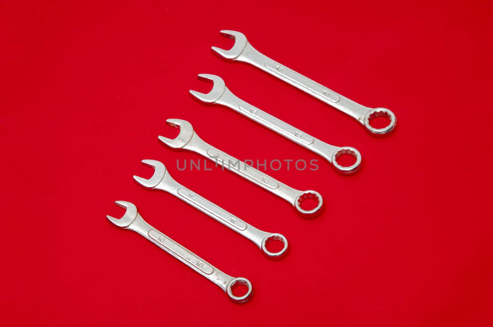 industrial tools on a red background