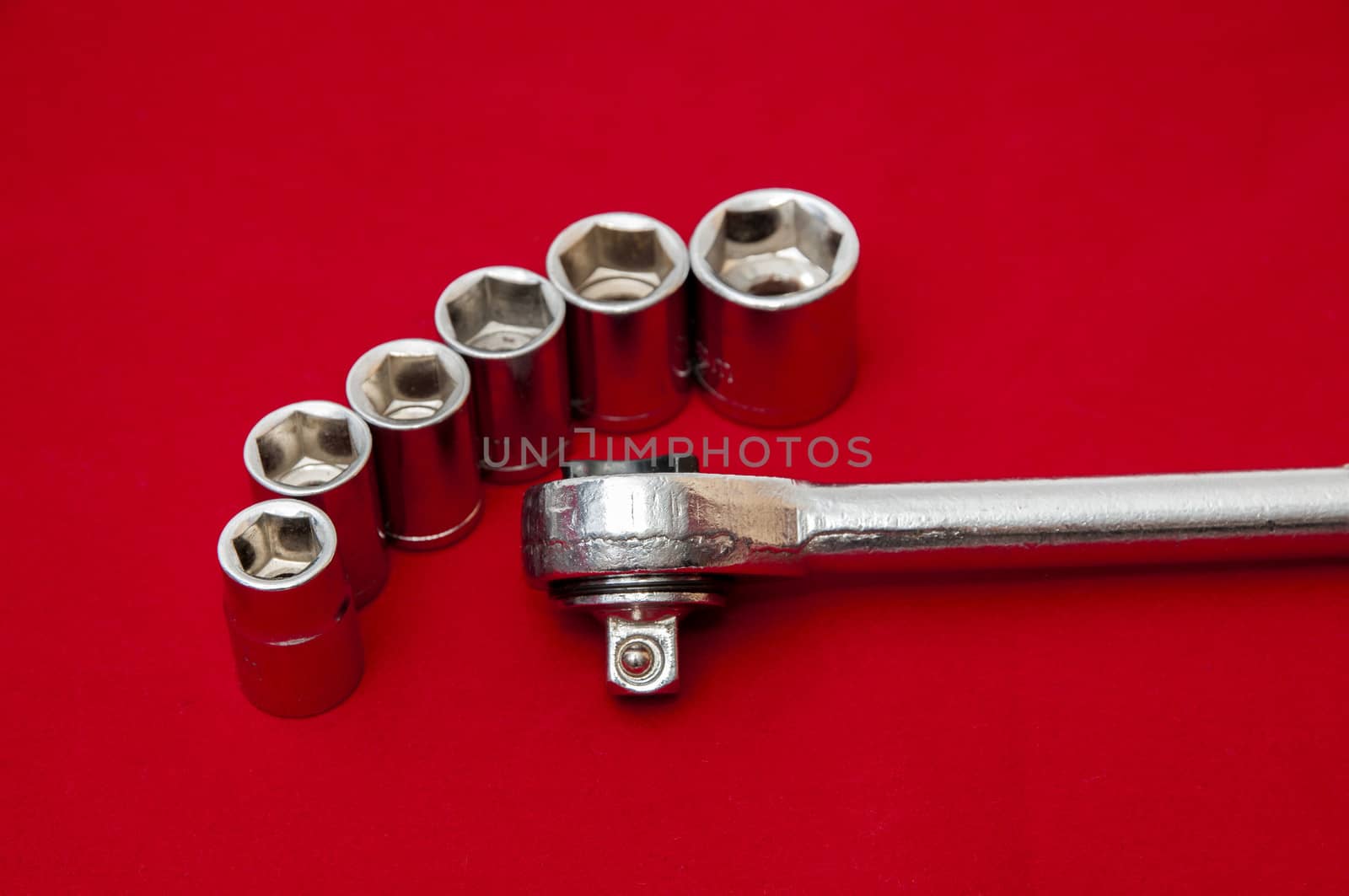 industrial tools on a red background