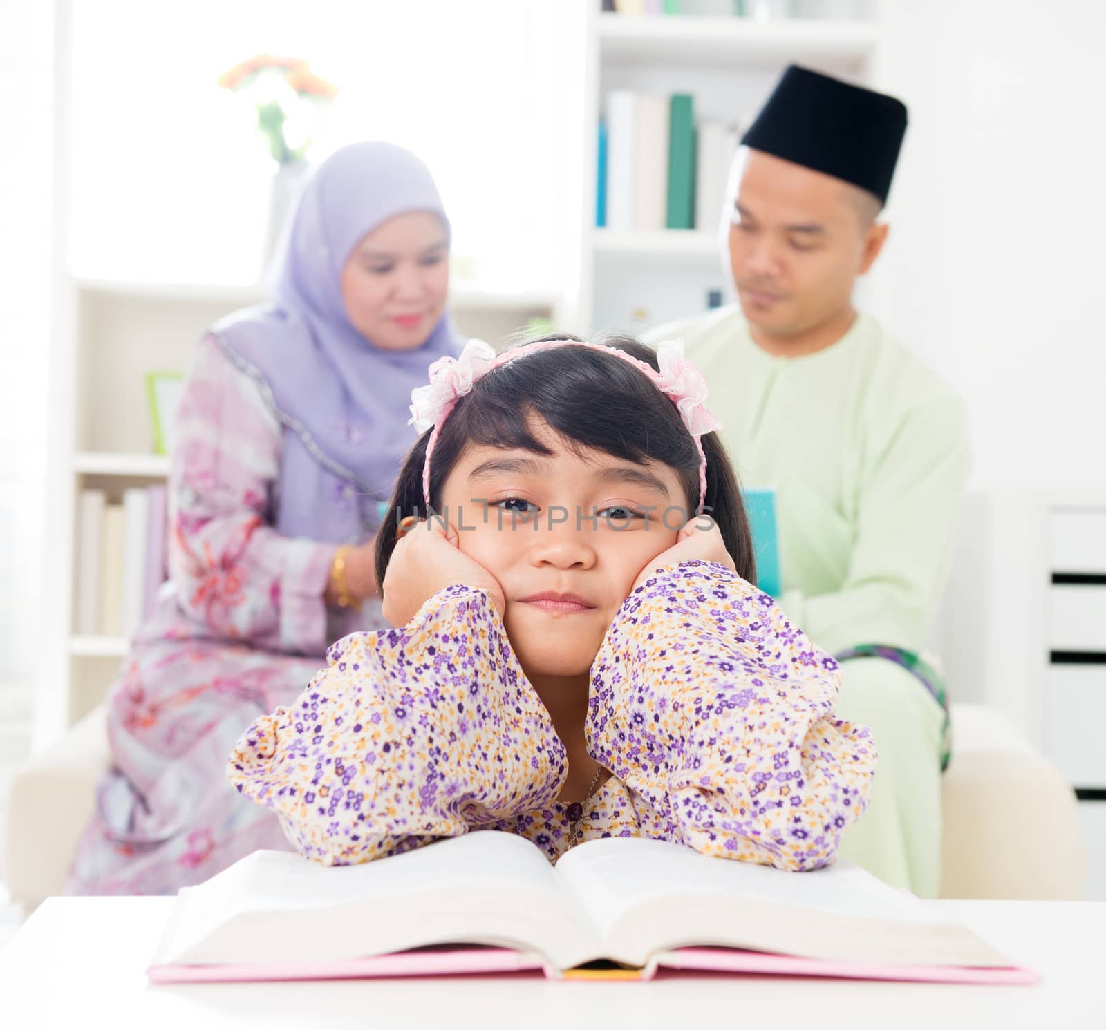 Malay girl reading book. by szefei