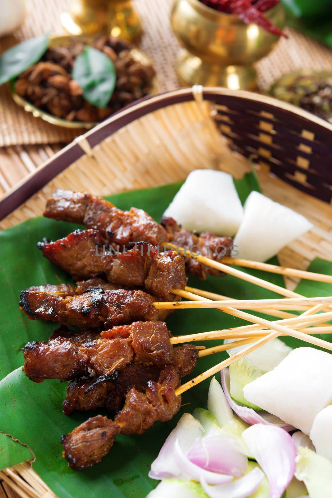 Beef satay, roasted meat skewer Malay food. Traditional Singapore food. Hot and spicy Singaporean dish, Asian cuisine.
