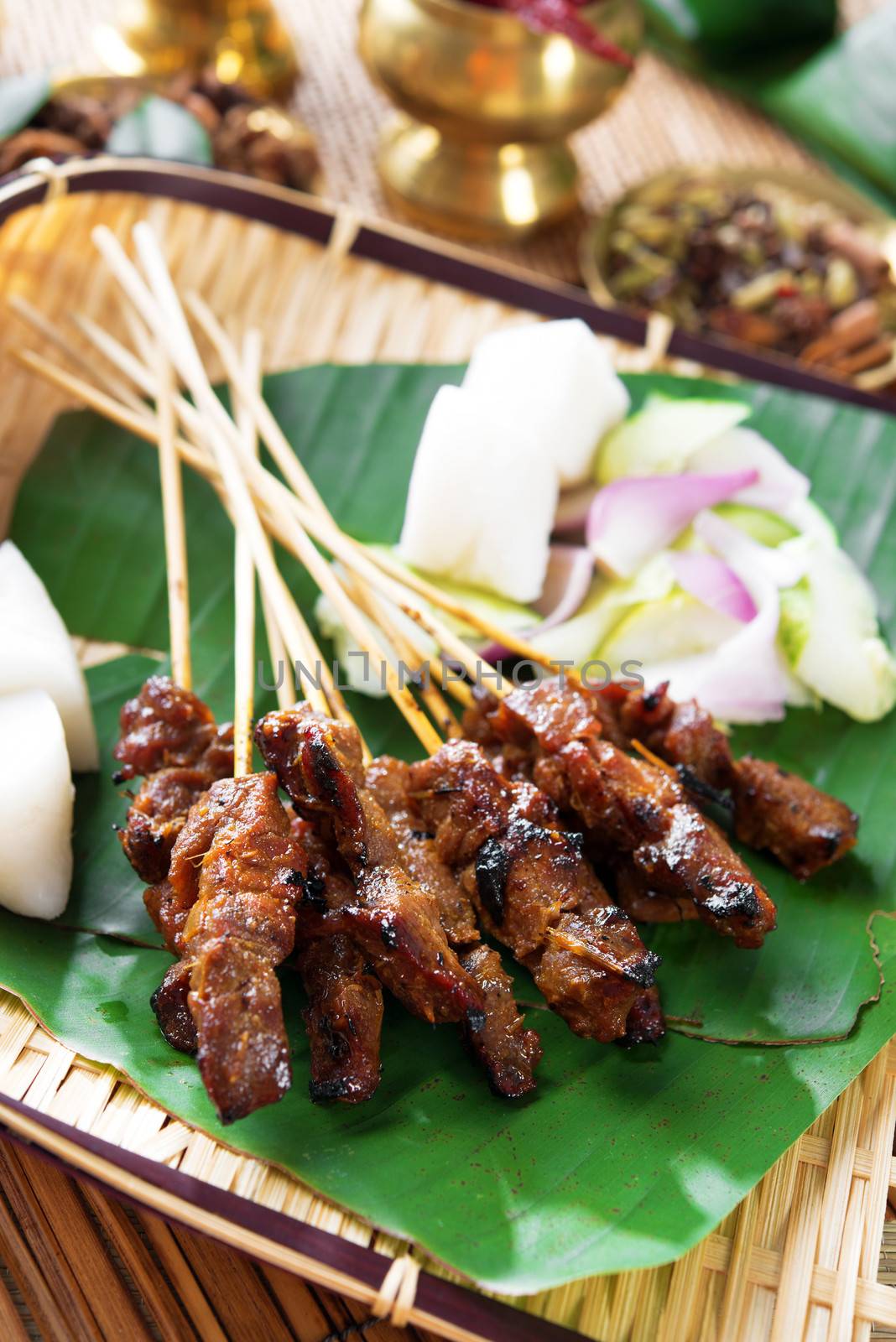 Beef satay, roasted meat skewer Asia food.
 Traditional Southeast Asia food.  Hot and spicy Southeast Asian dish, Asian cuisine.
