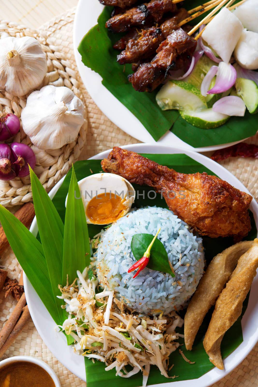 Nasi kerabu, popular Malaysian Malay rice dish. Traditional east coast blue rice. Famous in states such as Terengganu or Kelantan . Malaysia food, Asian cuisine.