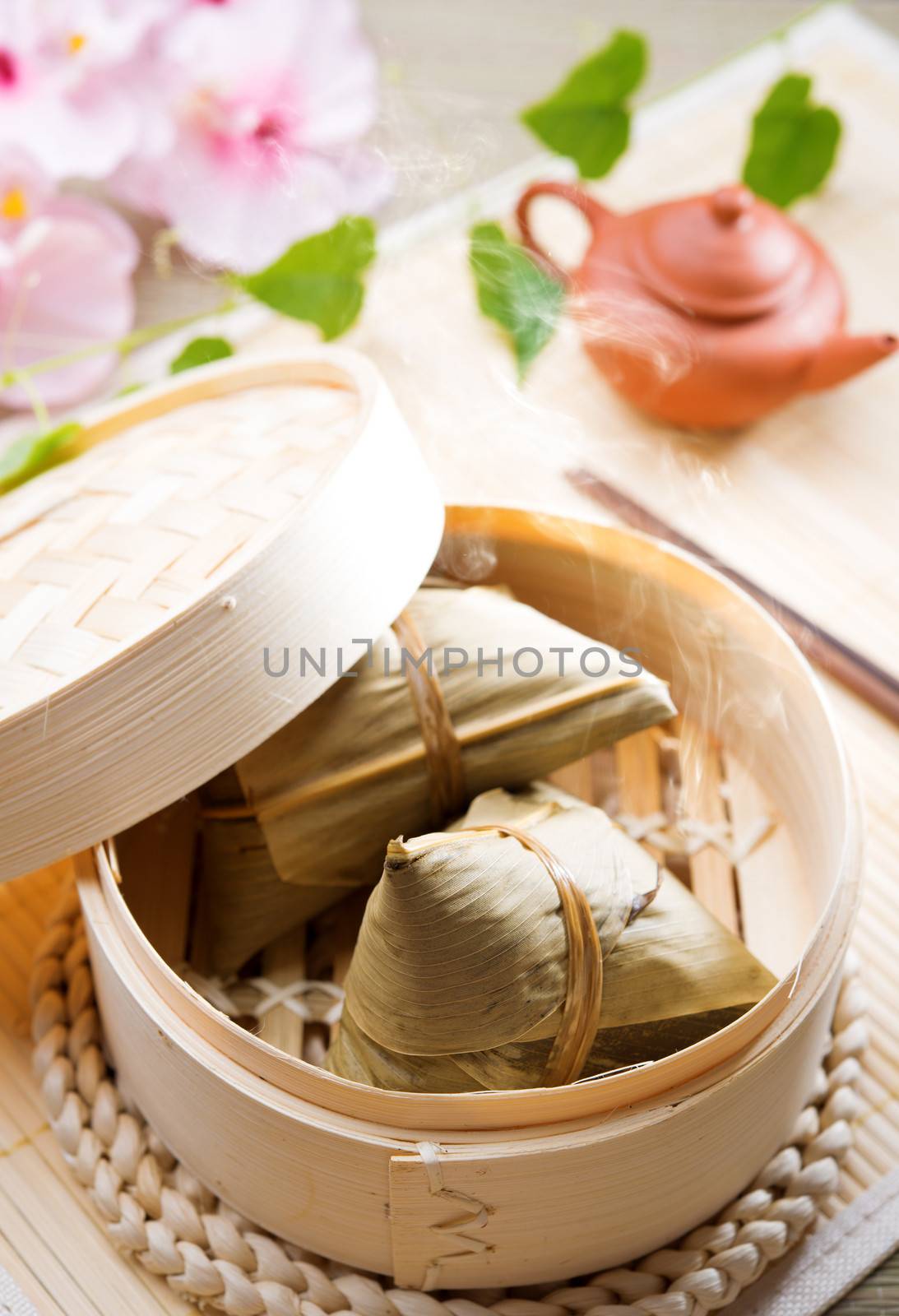 Rice dumpling or zongzi. Traditional steamed sticky  glutinous rice dumplings. Chinese food dim sum. Asian cuisine. 