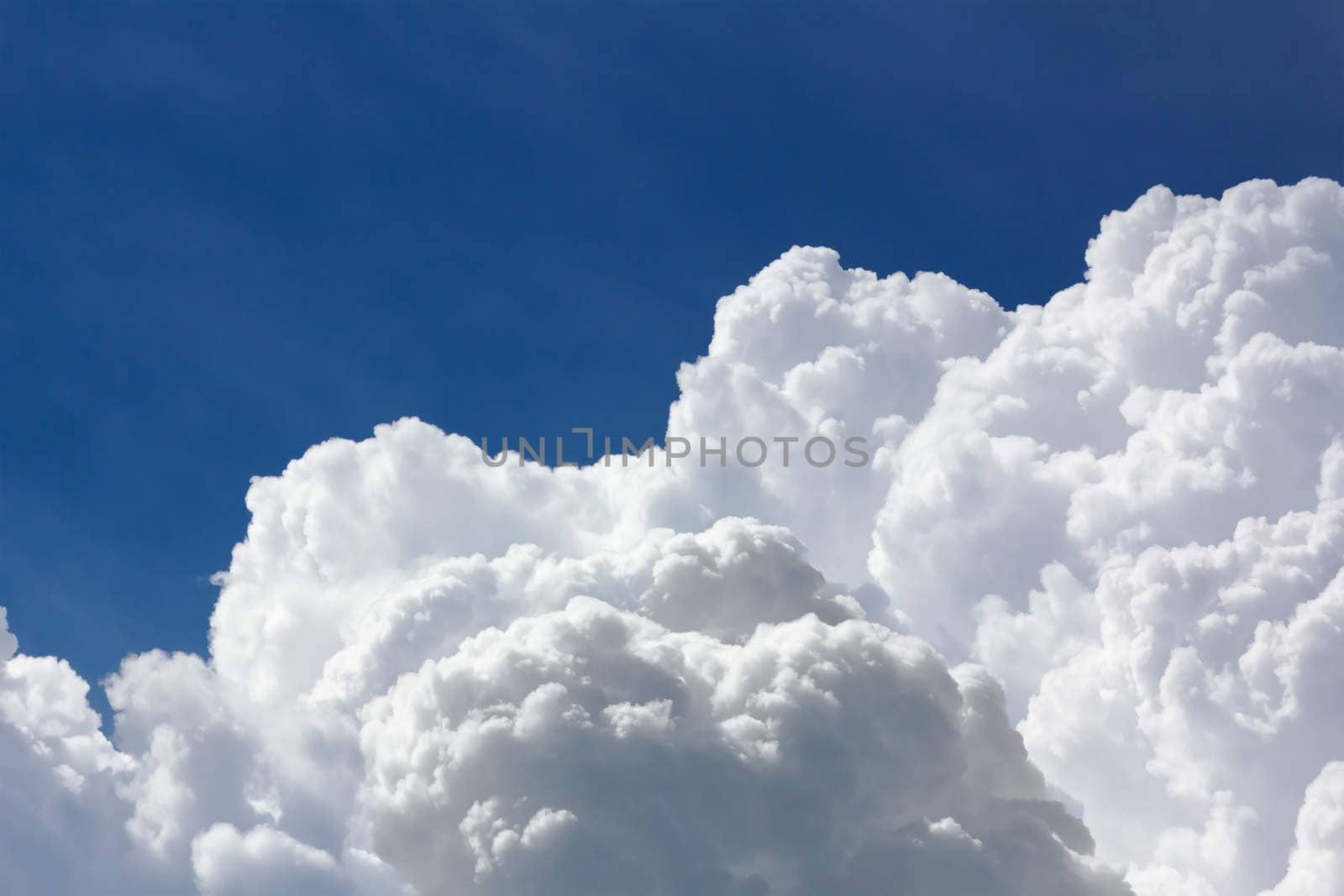 White and gray clouds in blue sky before rain