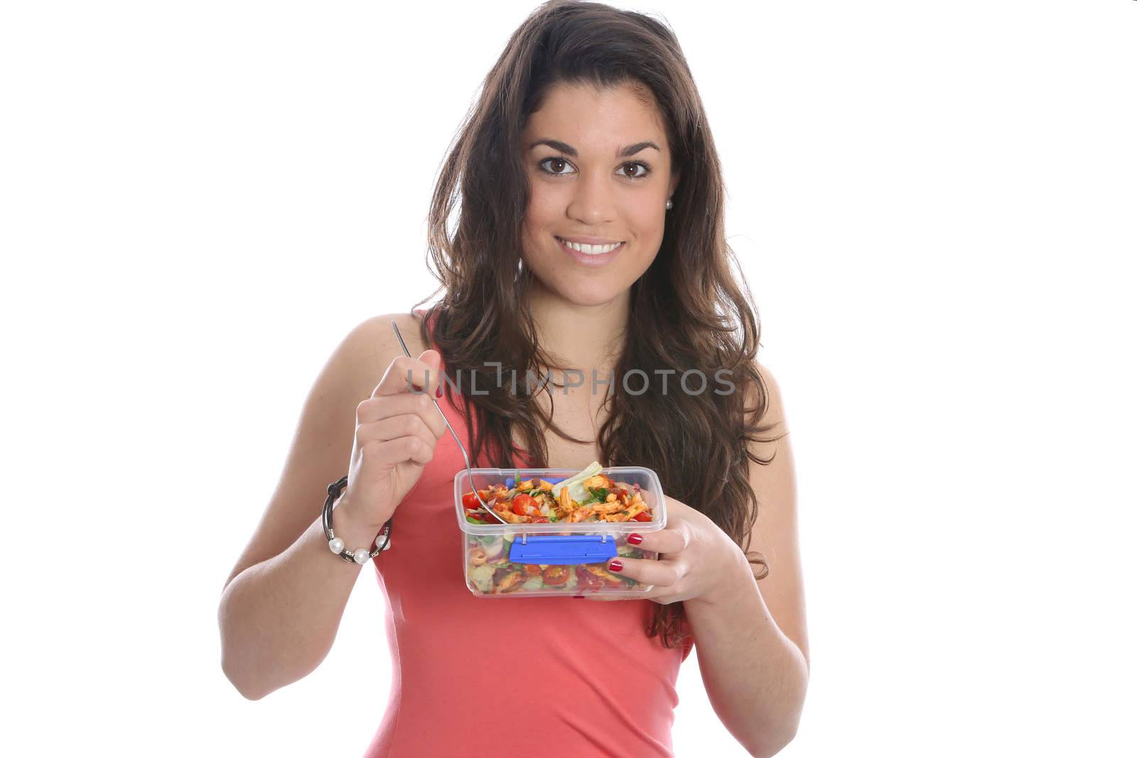 Model Released. Young Woman Eating Pasta Salad