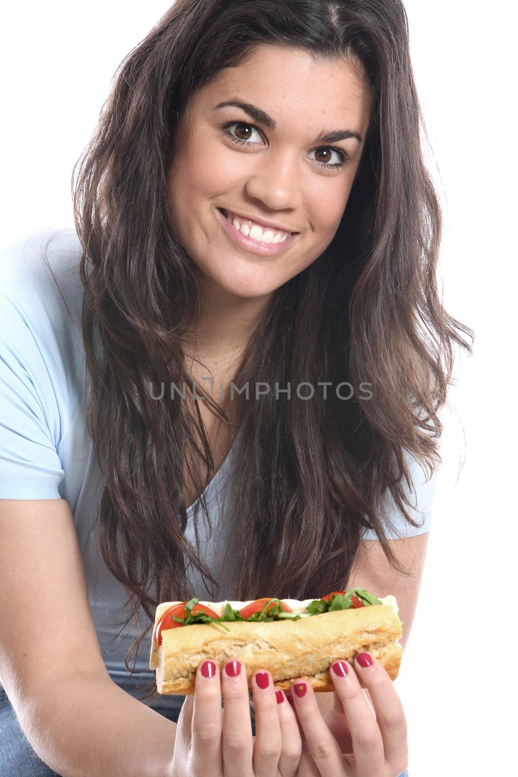 Model Released. Young Woman Eating Cheese and Tomato Roll