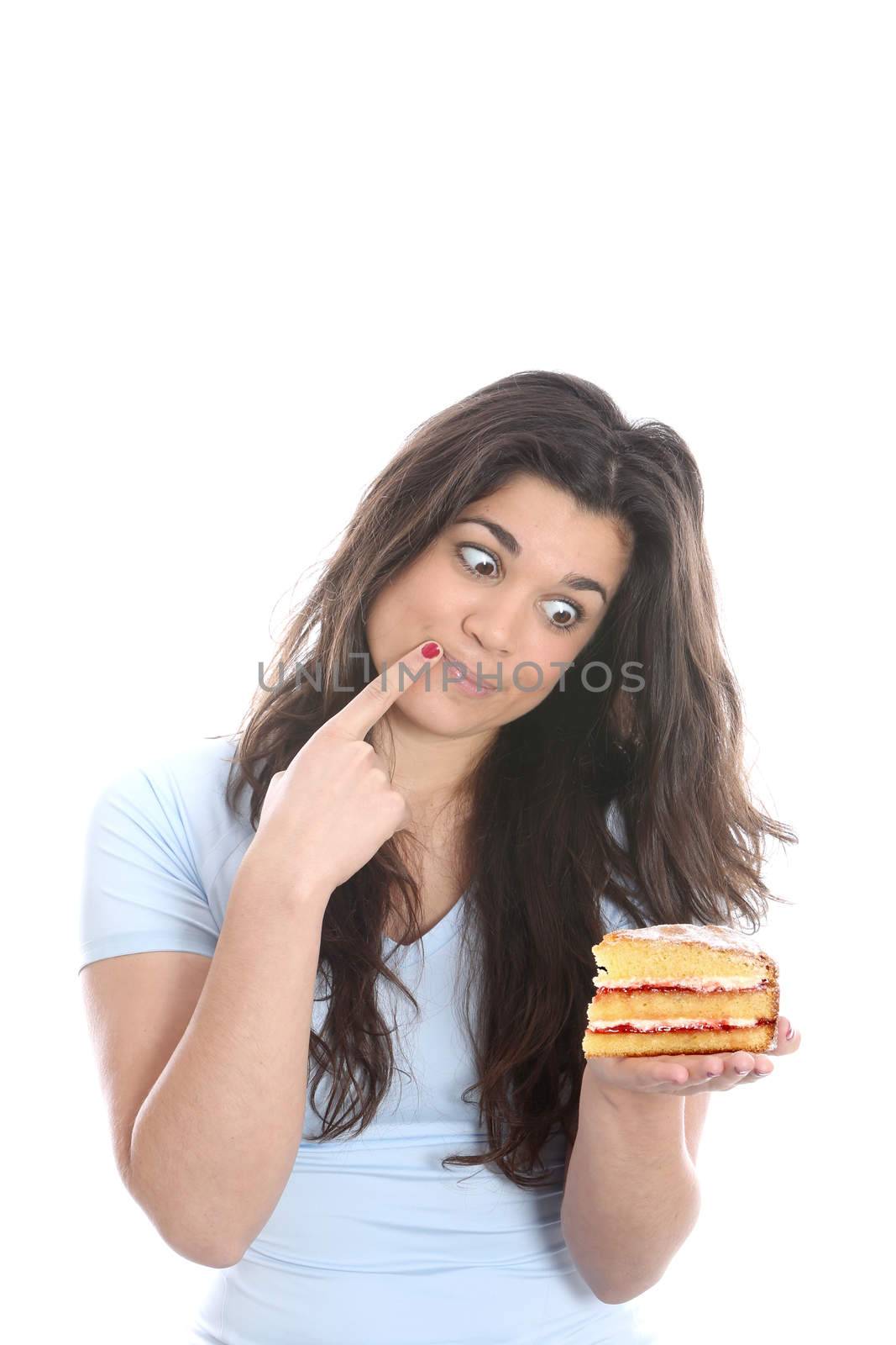 Model Released. Young Woman Holding Cake