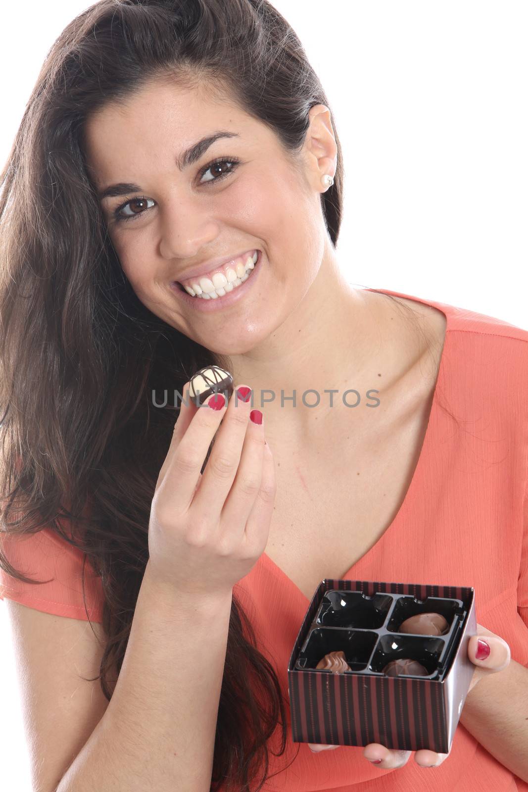 Model Released. Young Woman Holding a Box of Chocolates