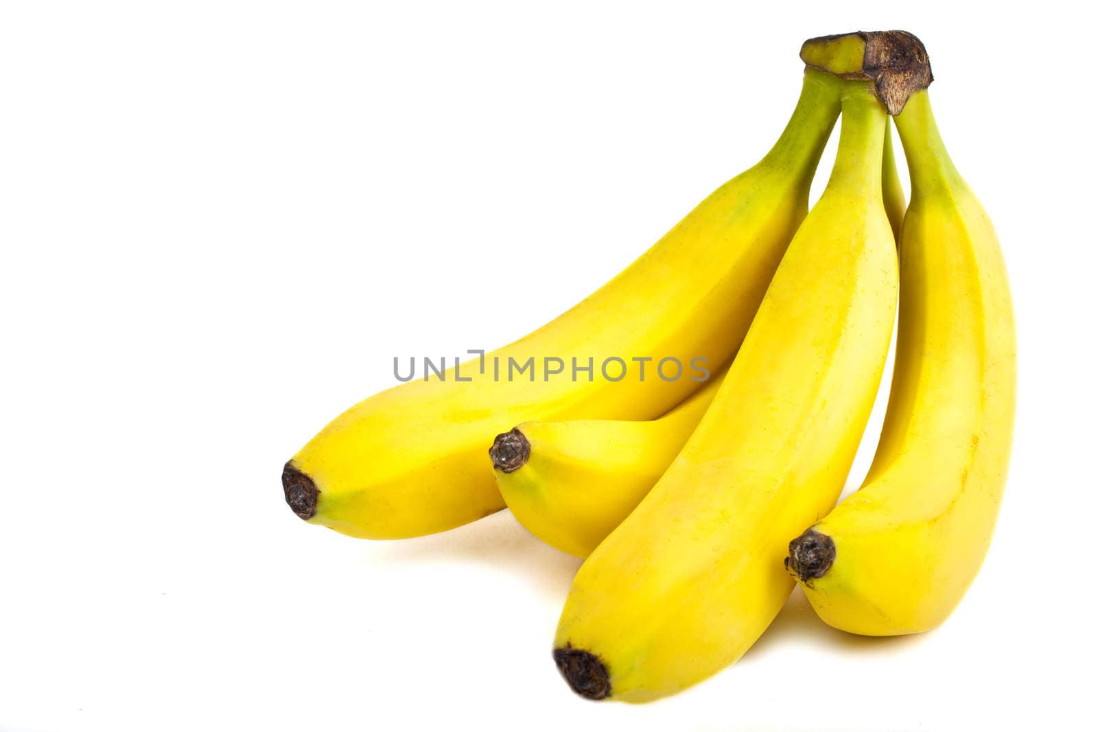 A bunch of Bananas isolated over a white background.