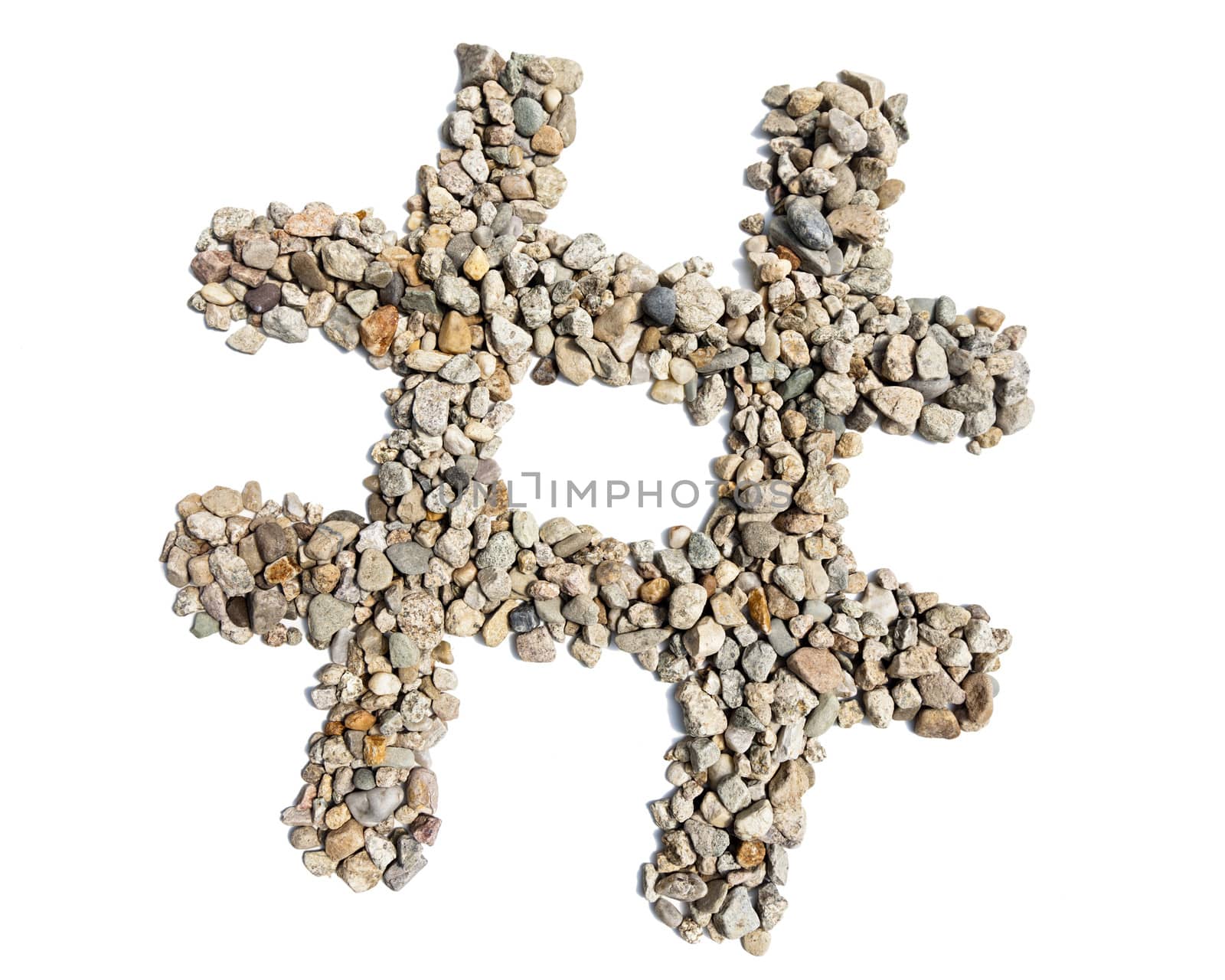 A hashtag made of stones and pebbles against a white background.