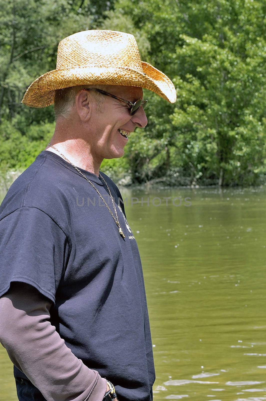 Cardet - France - May 18th, 19th and 20th, 2013 - European Cup of the gold diggers in river. a controller amused by a competitor