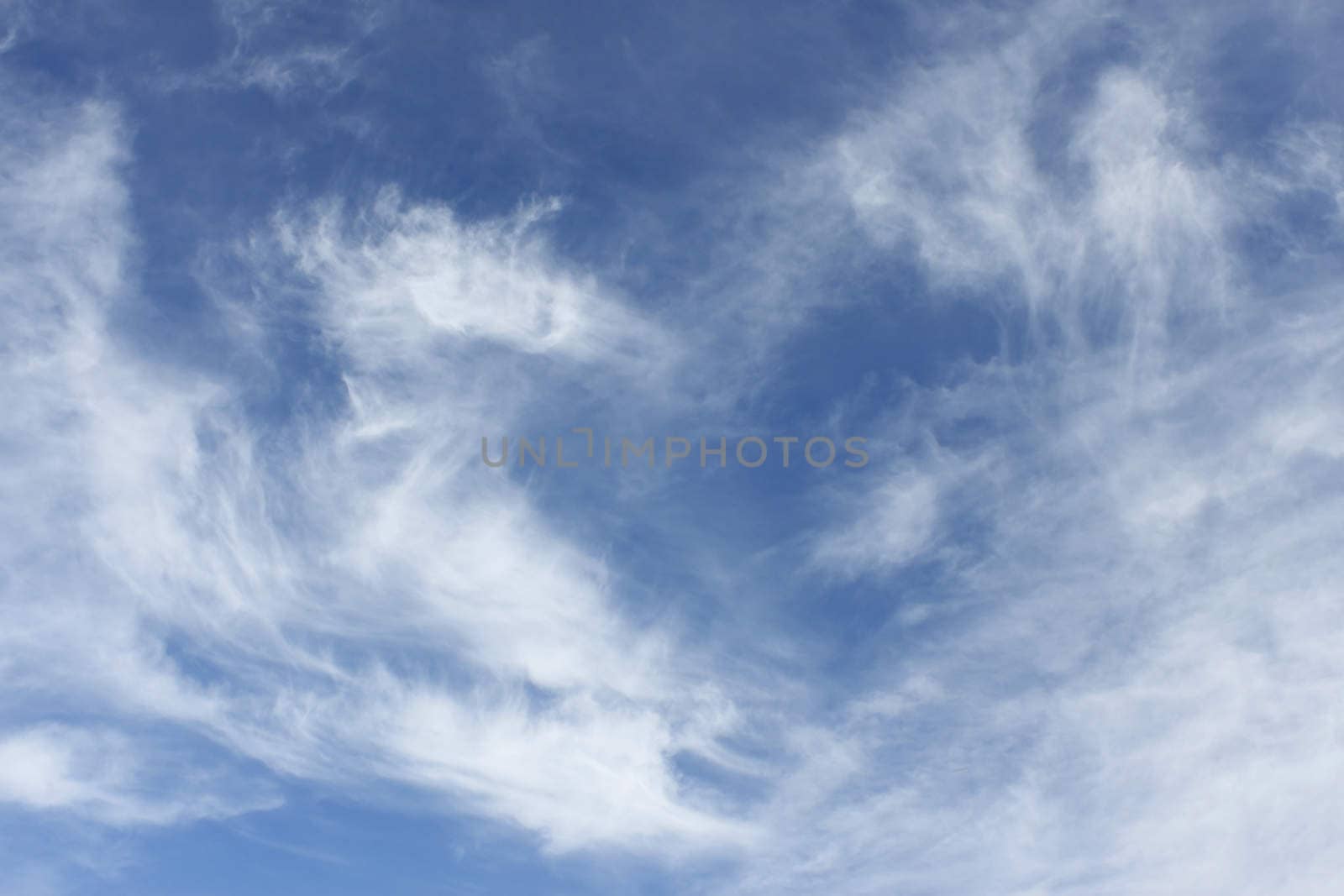 Heaven. Cloudscape of light white clouds, warm fine day