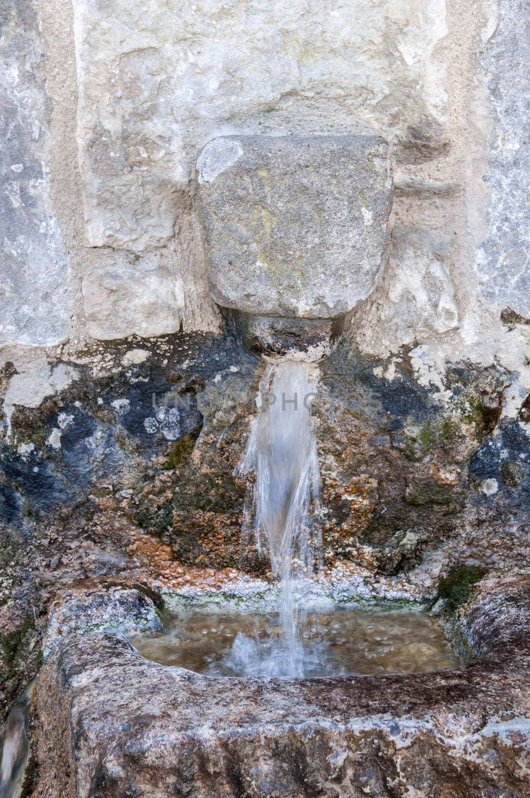 old fountain where water flows chilly