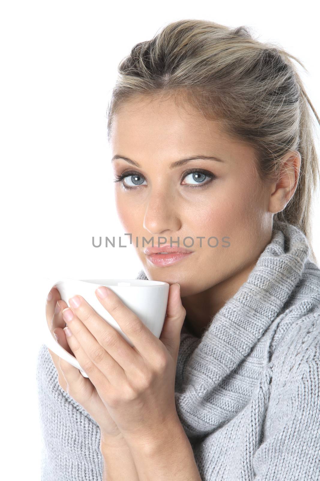 Woman Drinking a Mug of Coffee