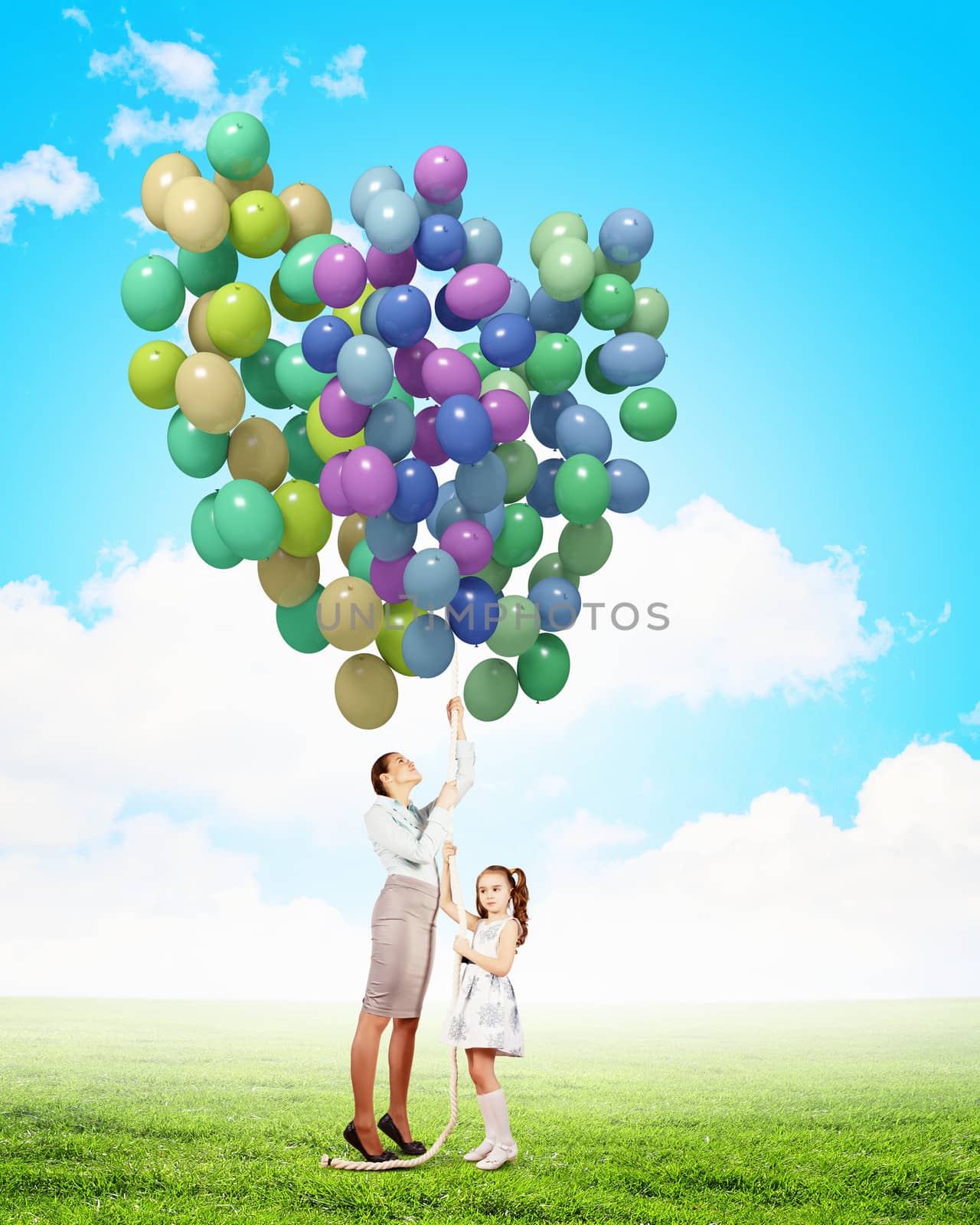 Mother and daughter with balloons by sergey_nivens