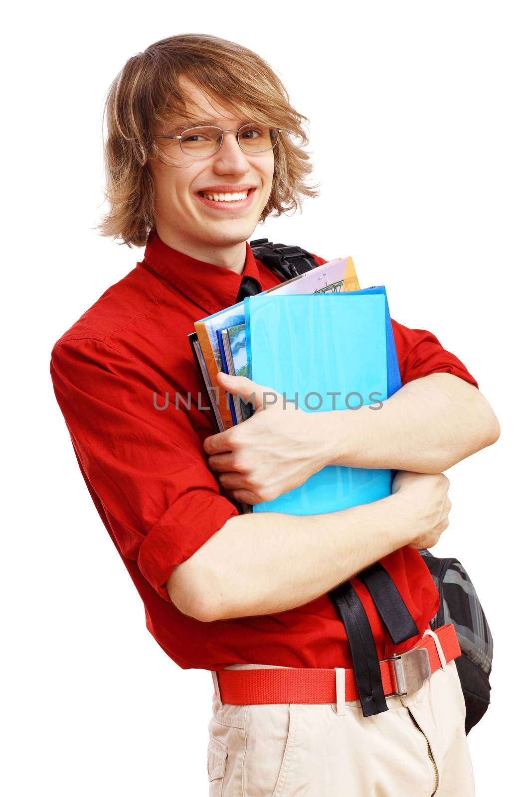 Happy smiling student standing and holding books