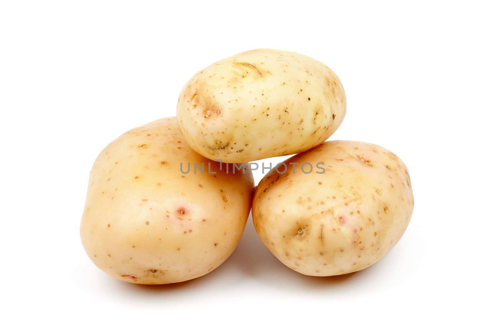 Heap of Three Raw New Harvest Potato isolated on white background