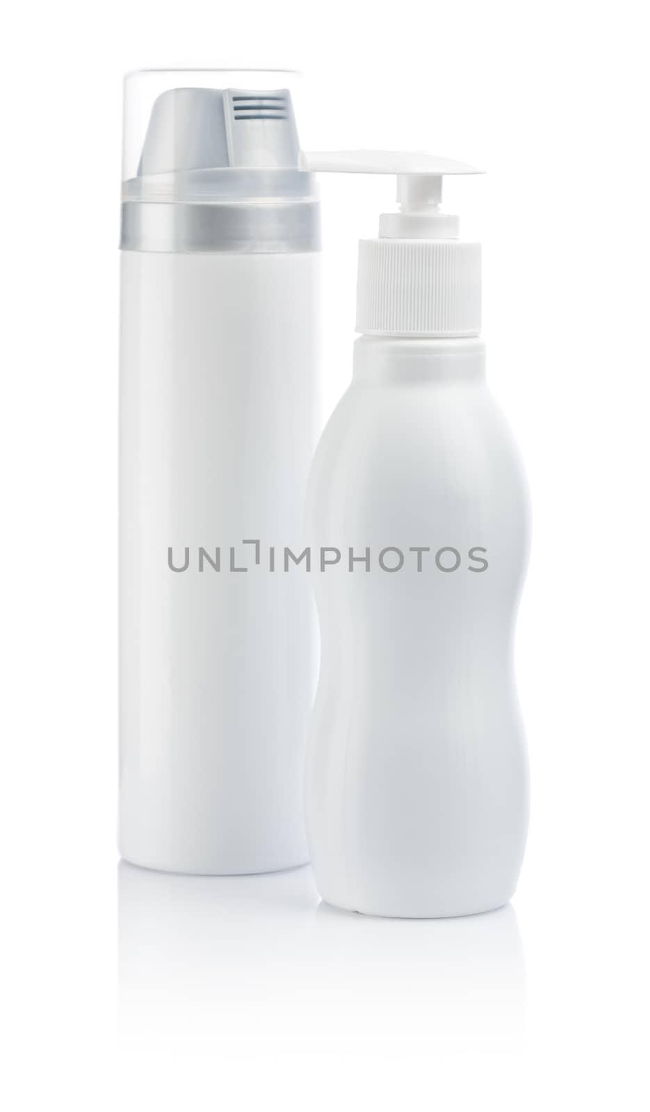 two white cosmetical bottles by mihalec