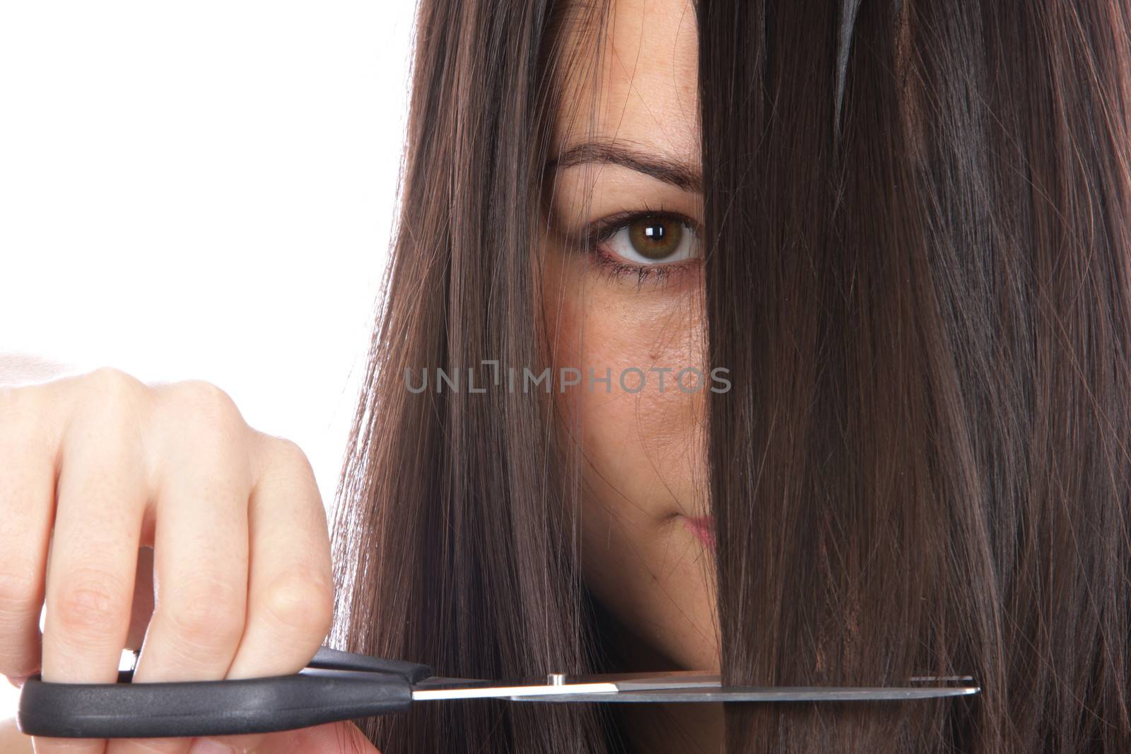 Young Woman Cutting Hair. Model Released