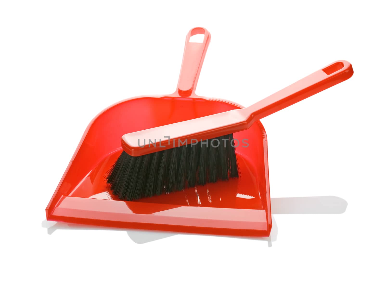 red brush on dustpan isolated