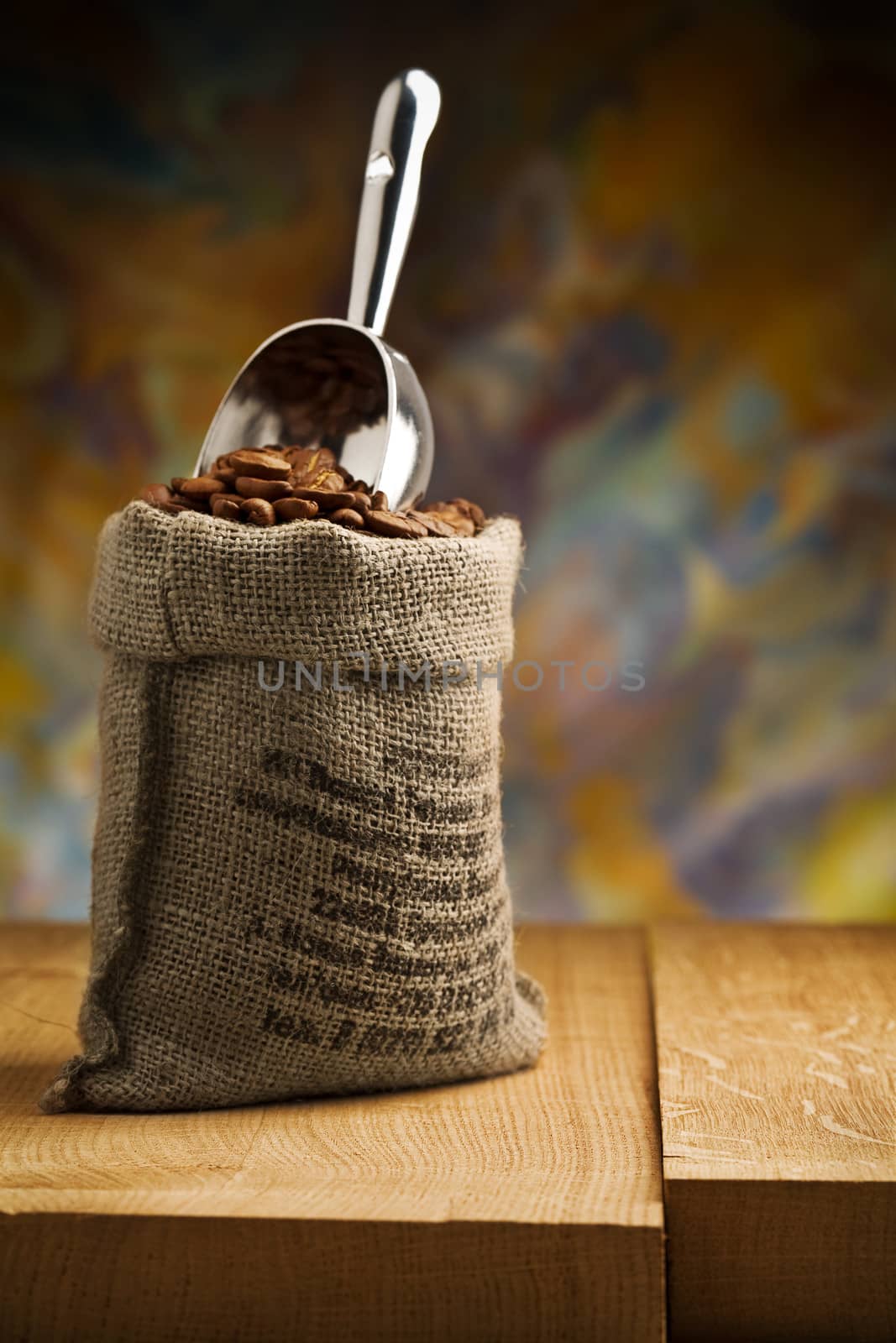small sack fith coffee beans and scoop