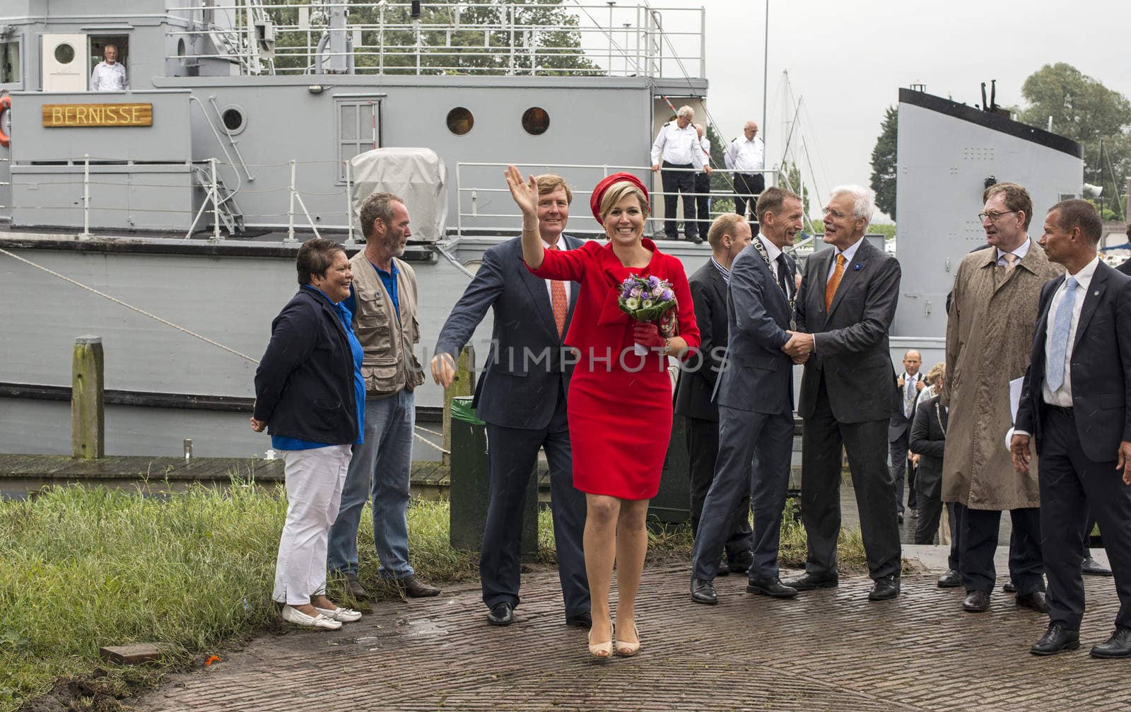 Hellevoetsluis,HOLLAND - JUNE 21:King Willem Alexander and Queen maxima showing to the dutch citizens,on June 21,2013 in Hellevoetsluis,Holland.They visit the citizins because of his coronation