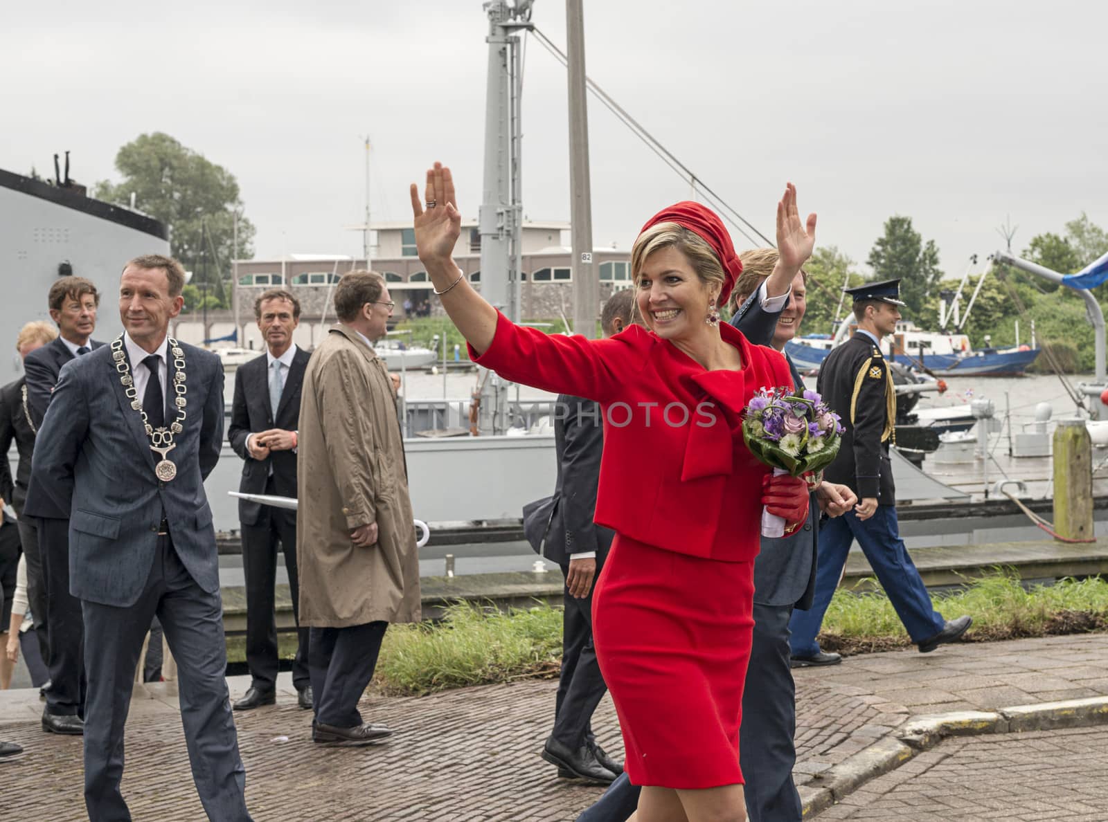 Hellevoetsluis,HOLLAND - JUNE 21:King Willem Alexander and Queen maxima showing to the dutch citizens,on June 21,2013 in Hellevoetsluis,Holland.They visit the citizins because of his coronation