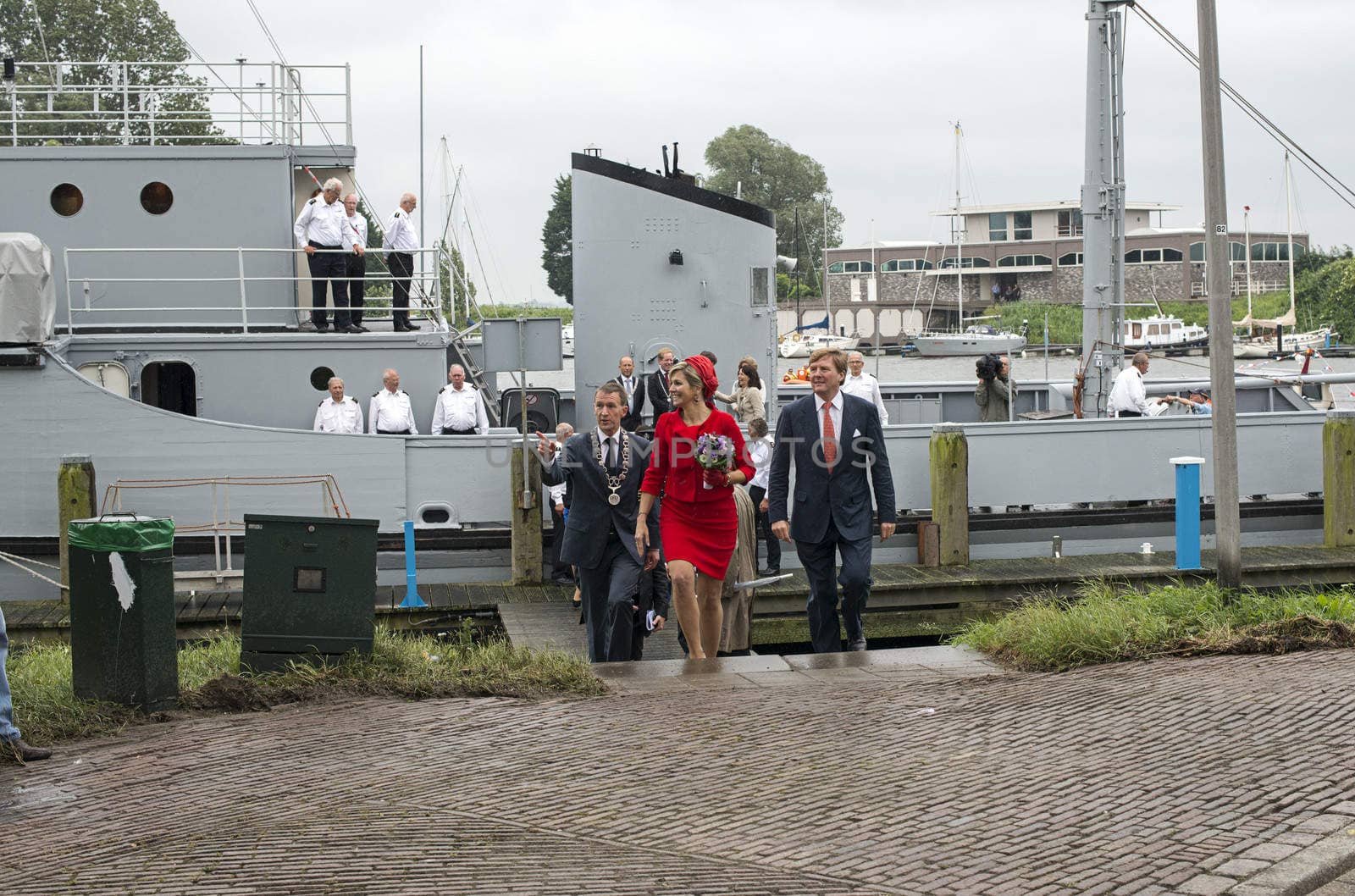 Hellevoetsluis,HOLLAND - JUNE 21:King Willem Alexander and Queen maxima showing to the dutch citizens,on June 21,2013 in Hellevoetsluis,Holland.They visit the citizins because of his coronation
