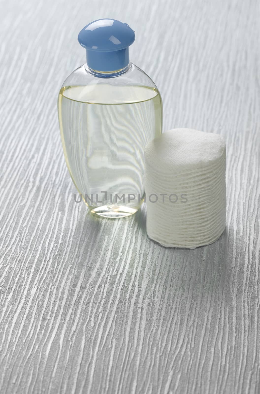 Bottle and cotton pads