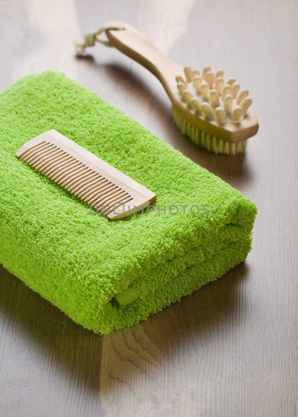 comb and massager with towel