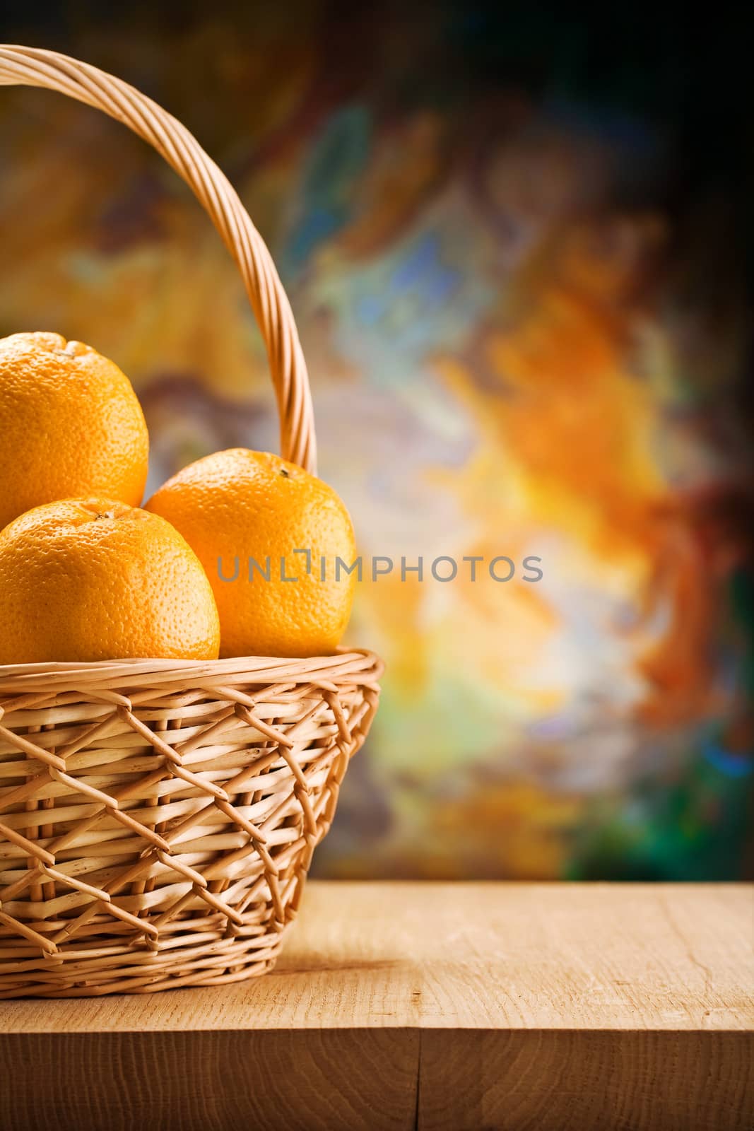 copy space oranges in wicker bast