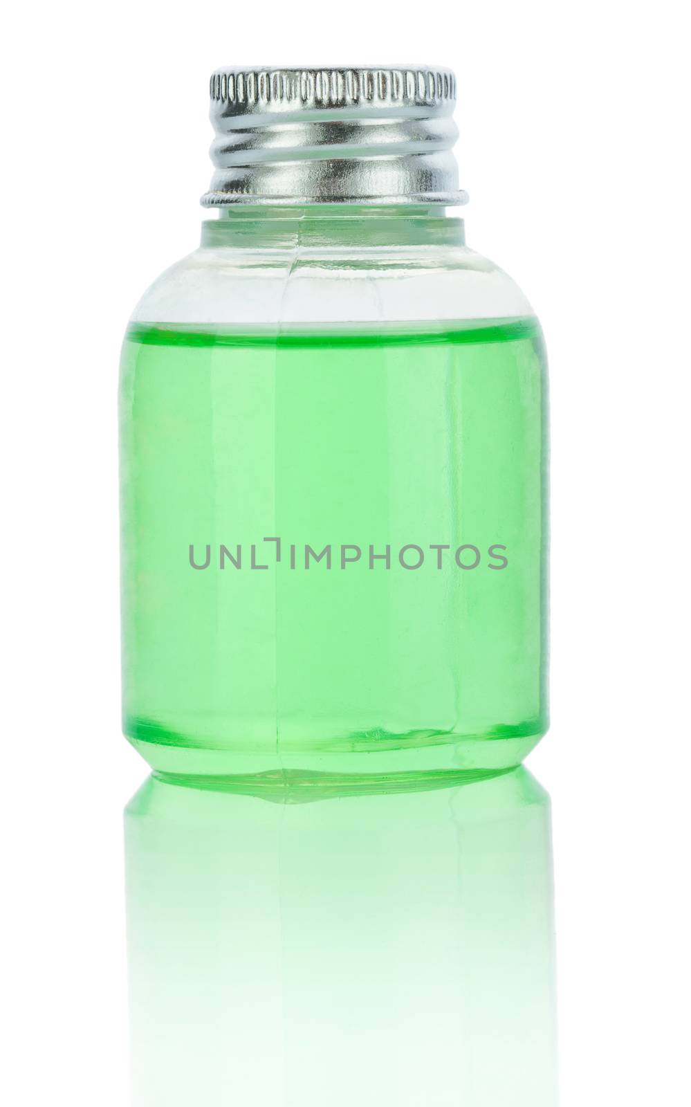 transparent plastical bottle with green liquid