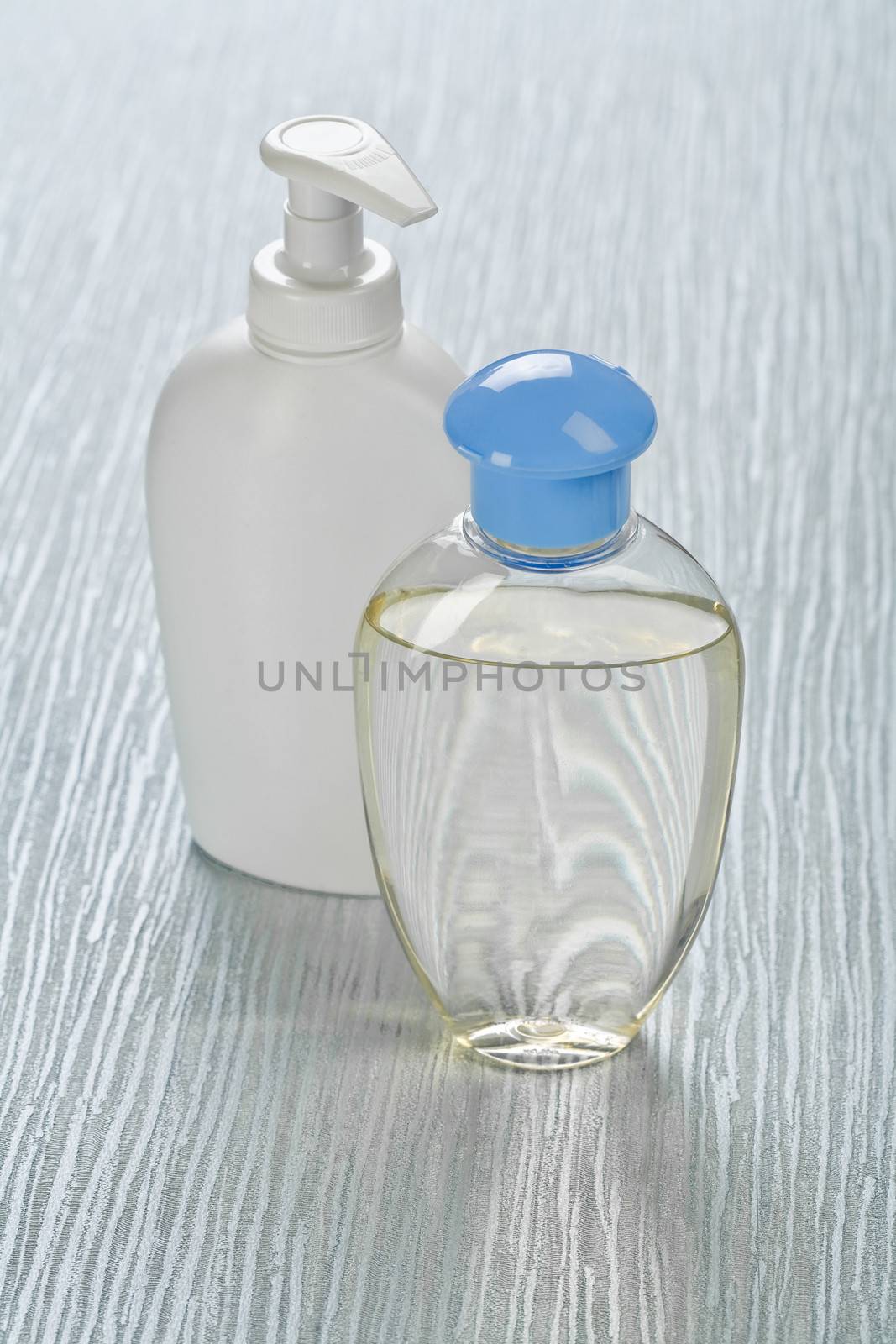 transparent and white bottles