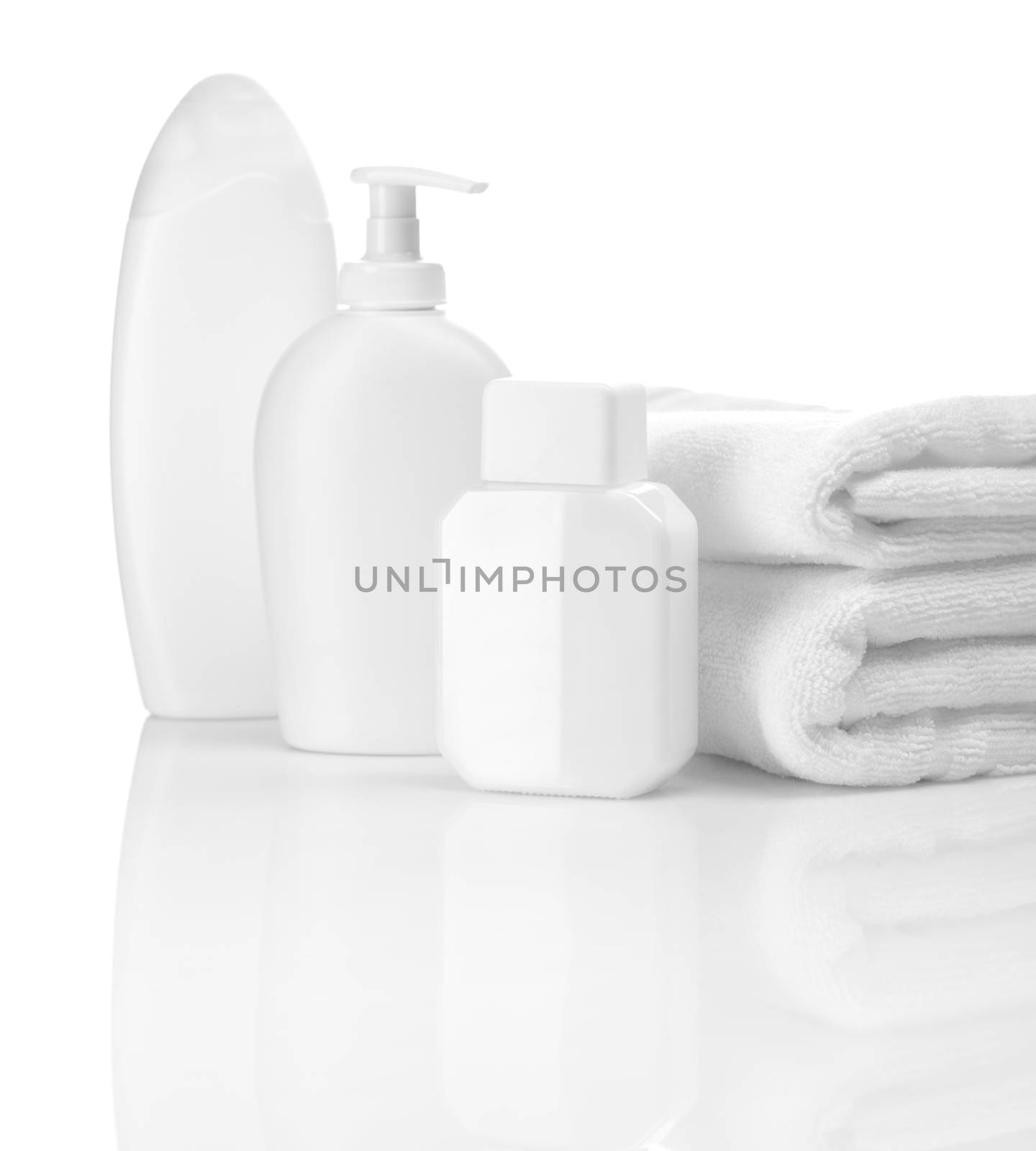 white bottles and towels