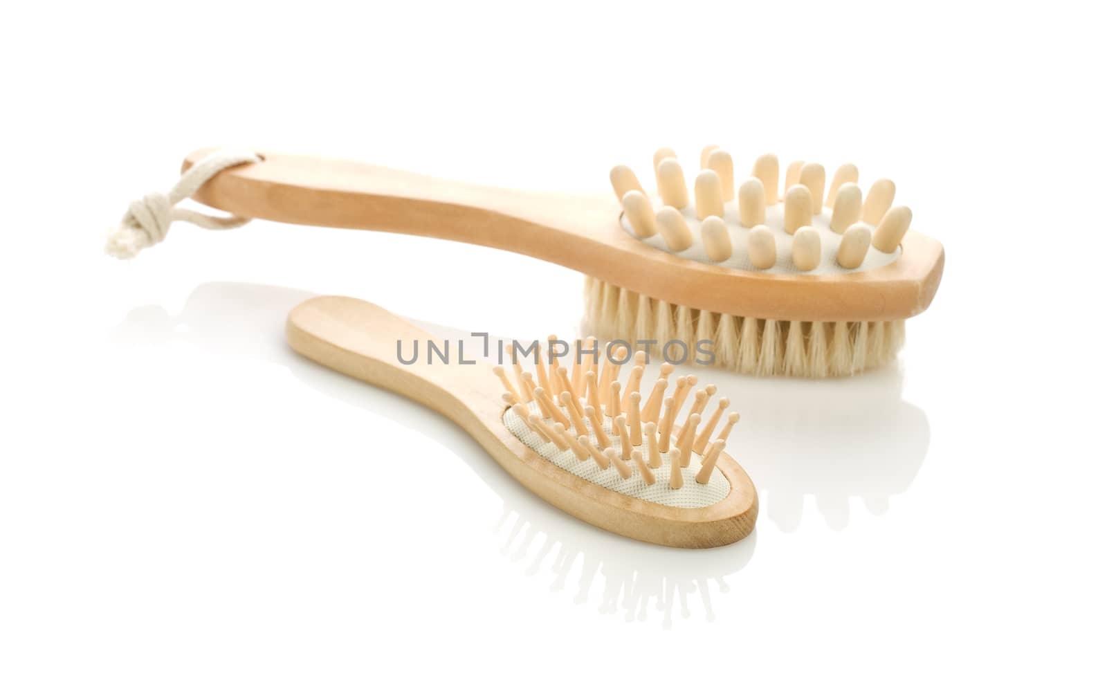 wooden hairbrush and brush