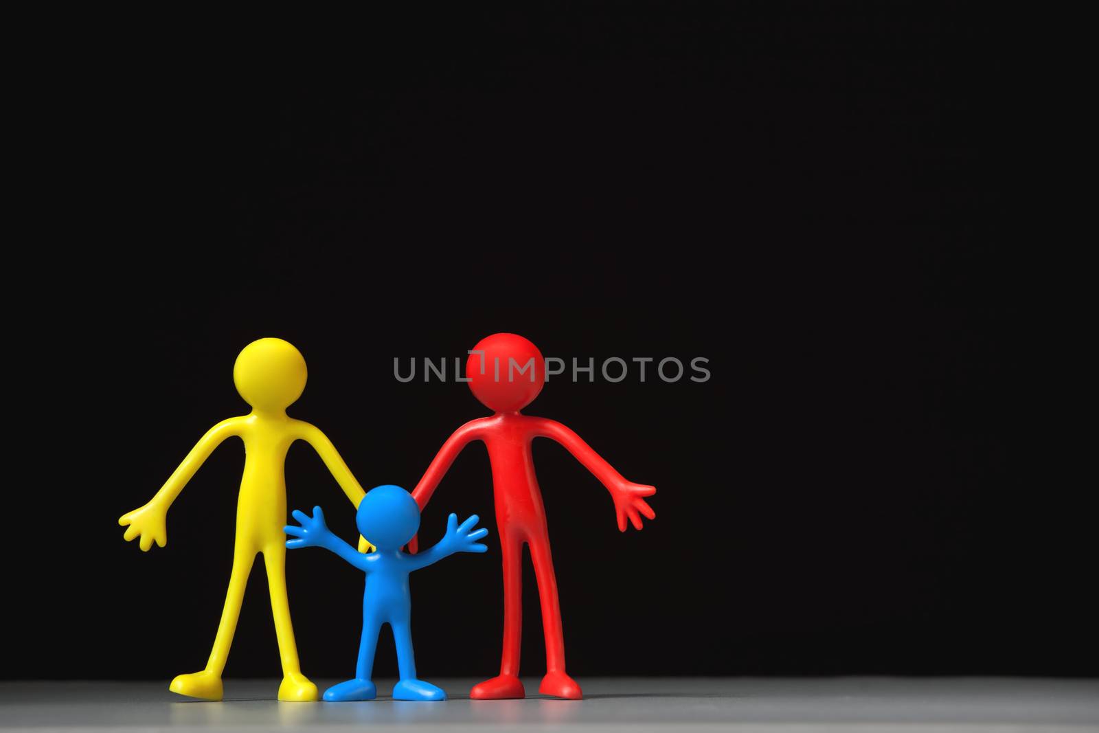 Family Concept. Colorful people on black background.