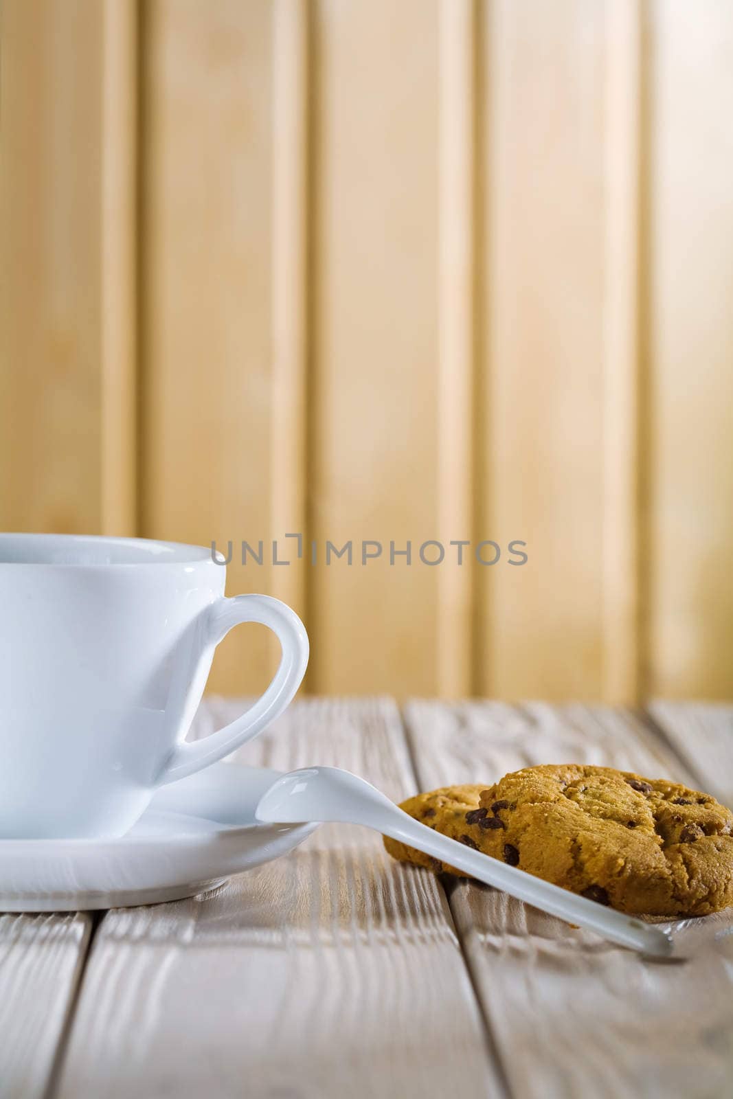 ceramic coffee cup and cookies