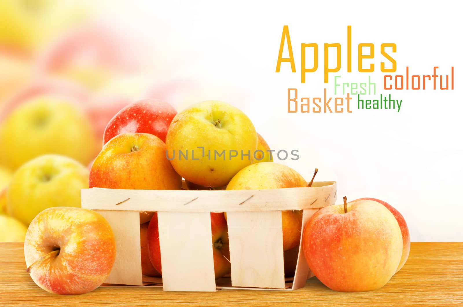 Fresh and colorful apples in basket, selective focus