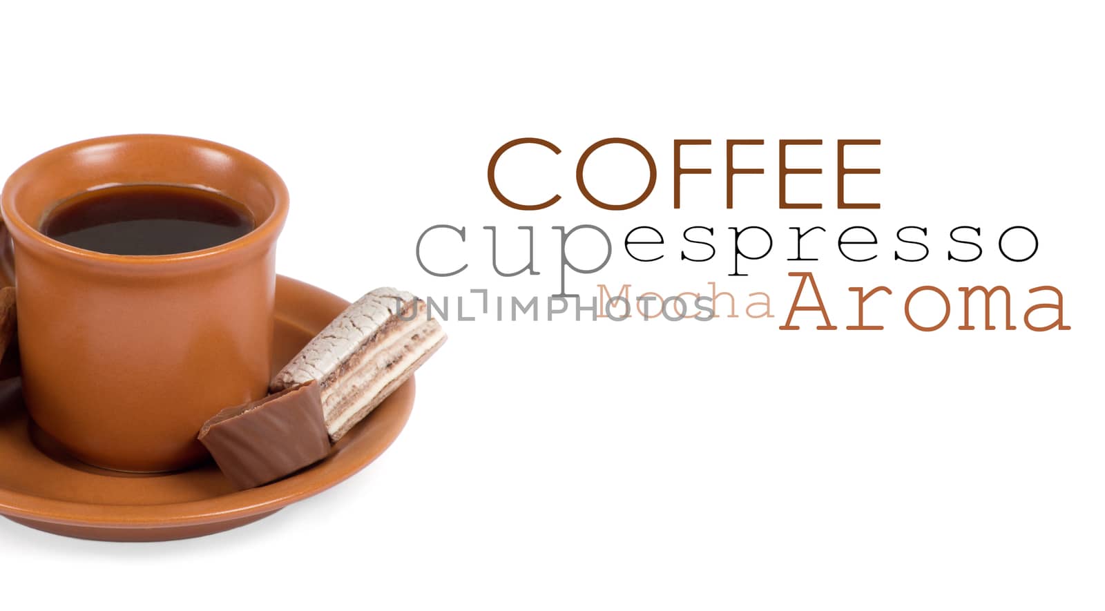 Closeup shot of freshly prepared cup of italian espresso with cinnamon and candy over white background
