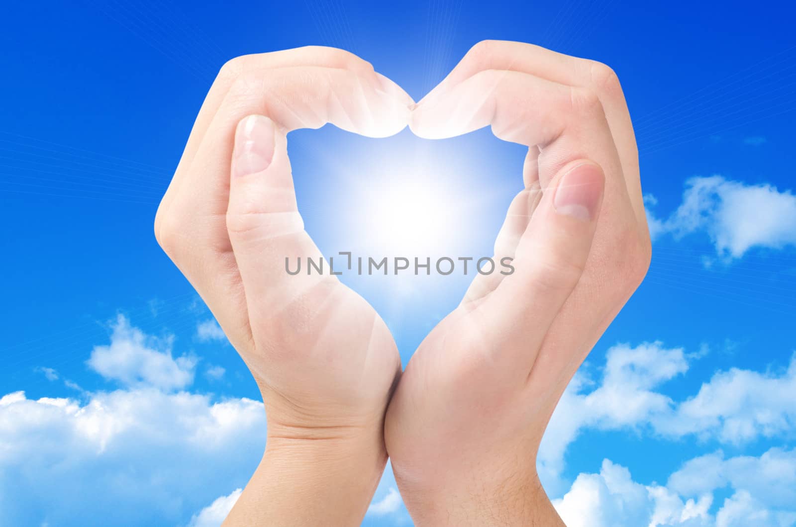 Two hands form a heart shape with their fingers
