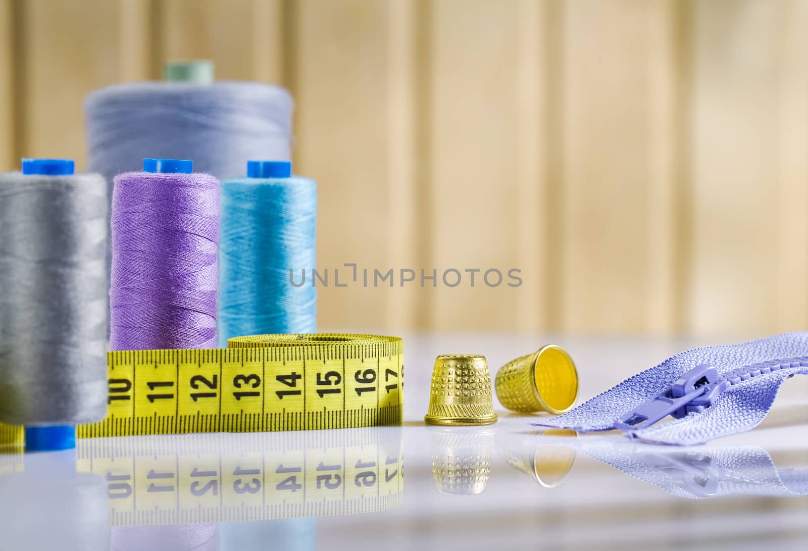 composition of sewing items on white table