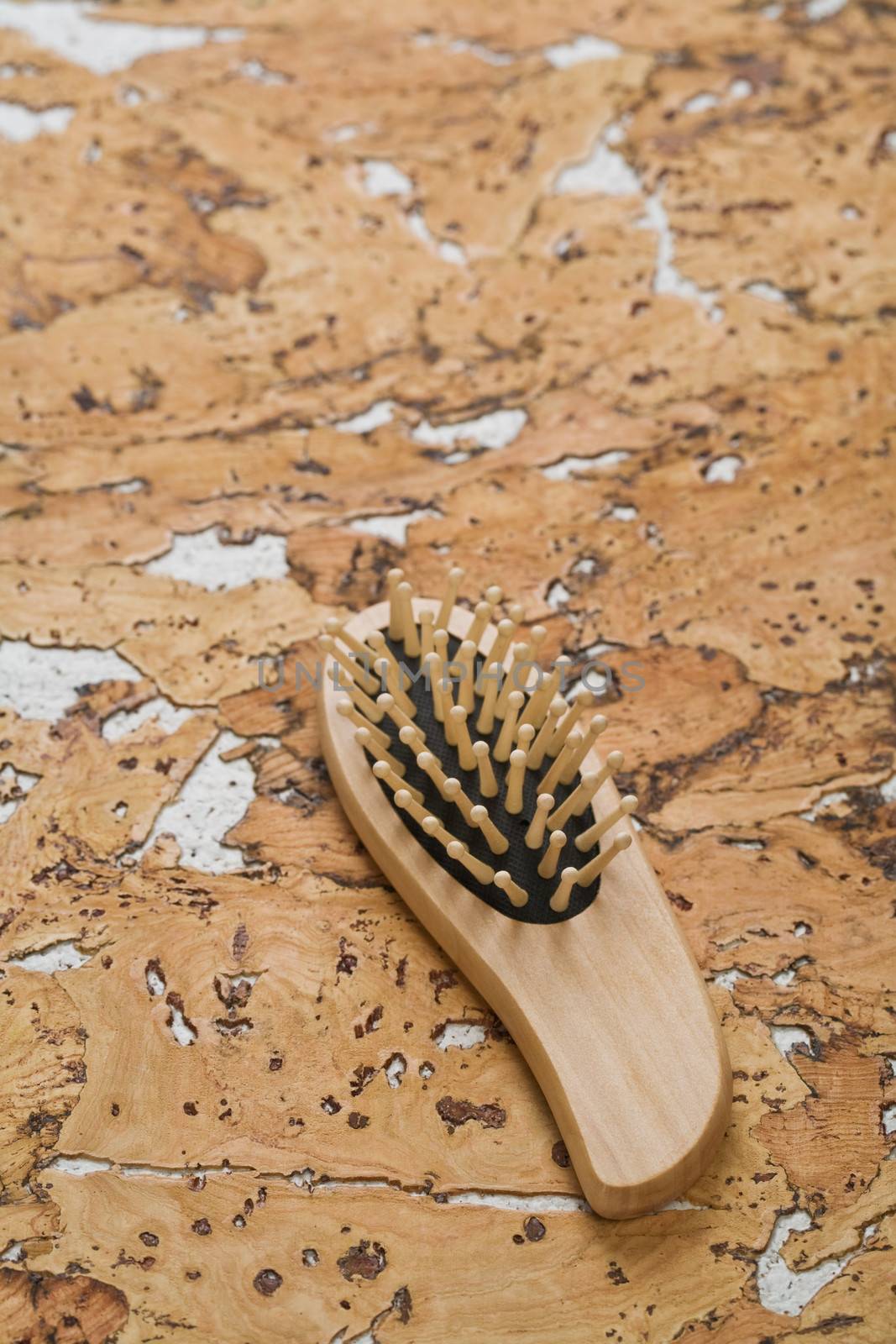 hairbrush on cork wood