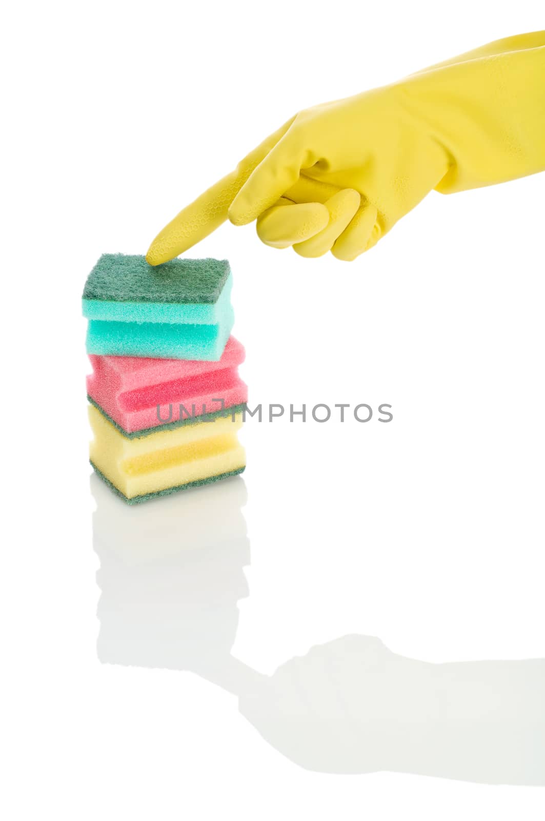 hand with colored sponges