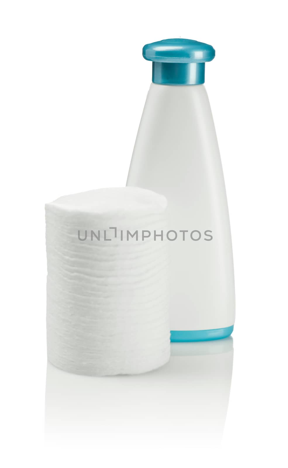 cotton pads and white bottle