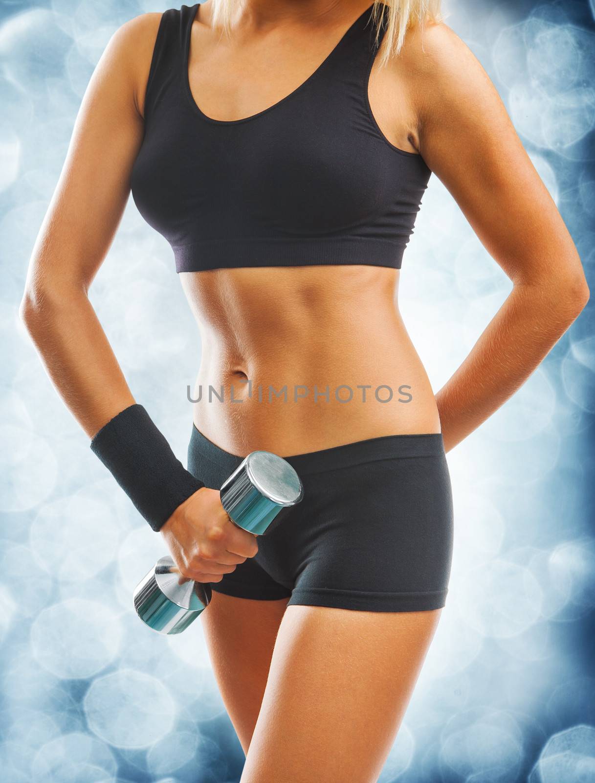 beautyful female body with dumbbell
