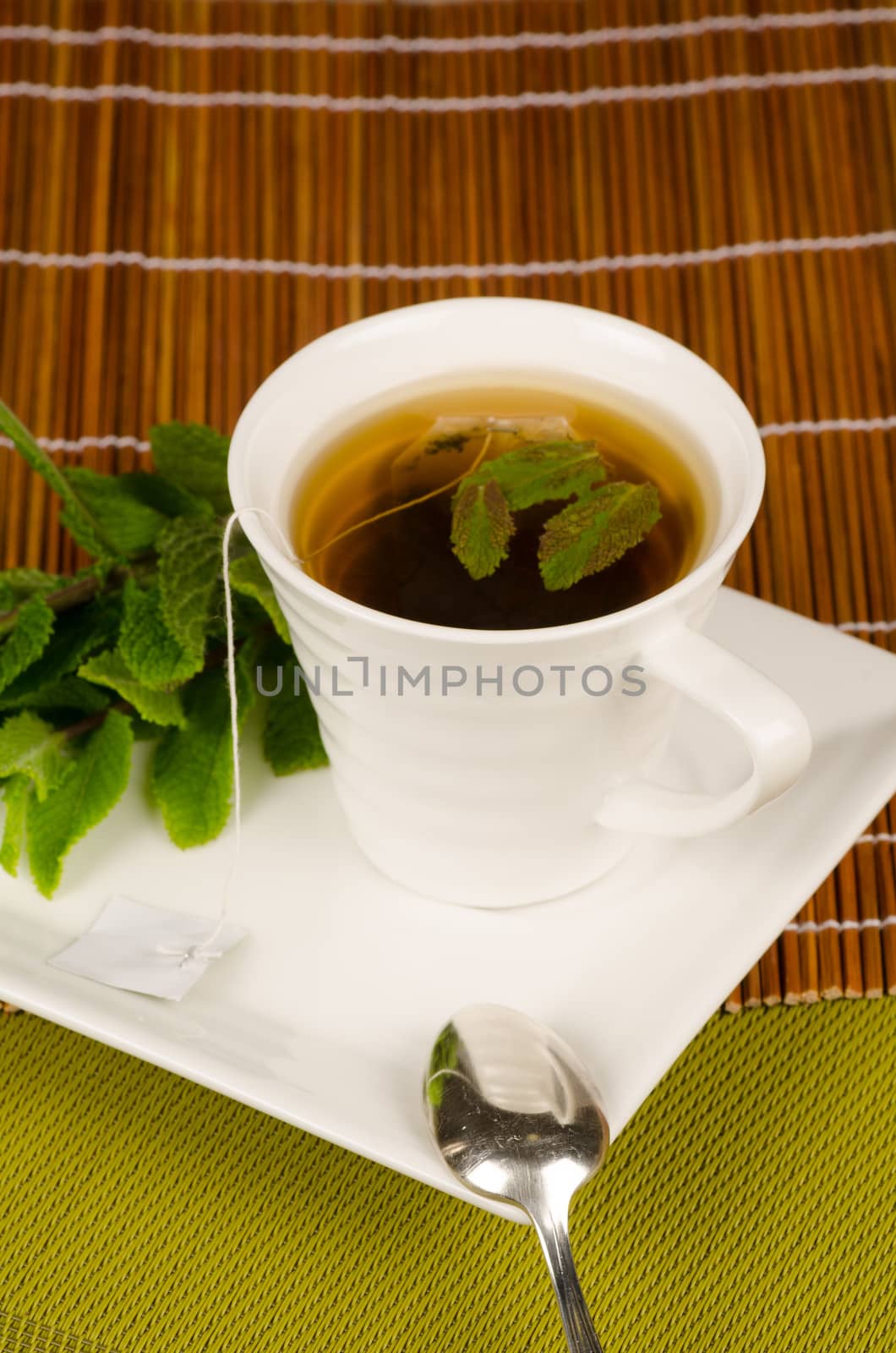 Green tea enhanced with aromatic mint leaves