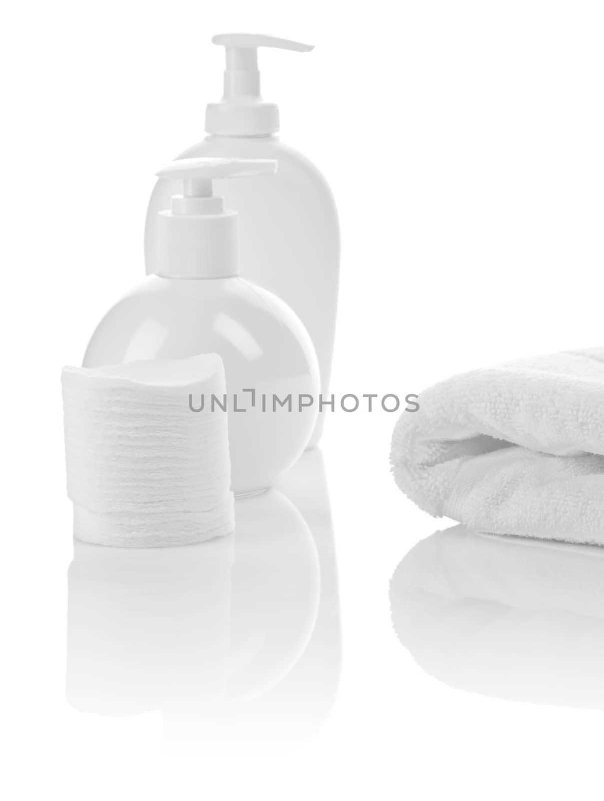 cotton pads bottles and towel