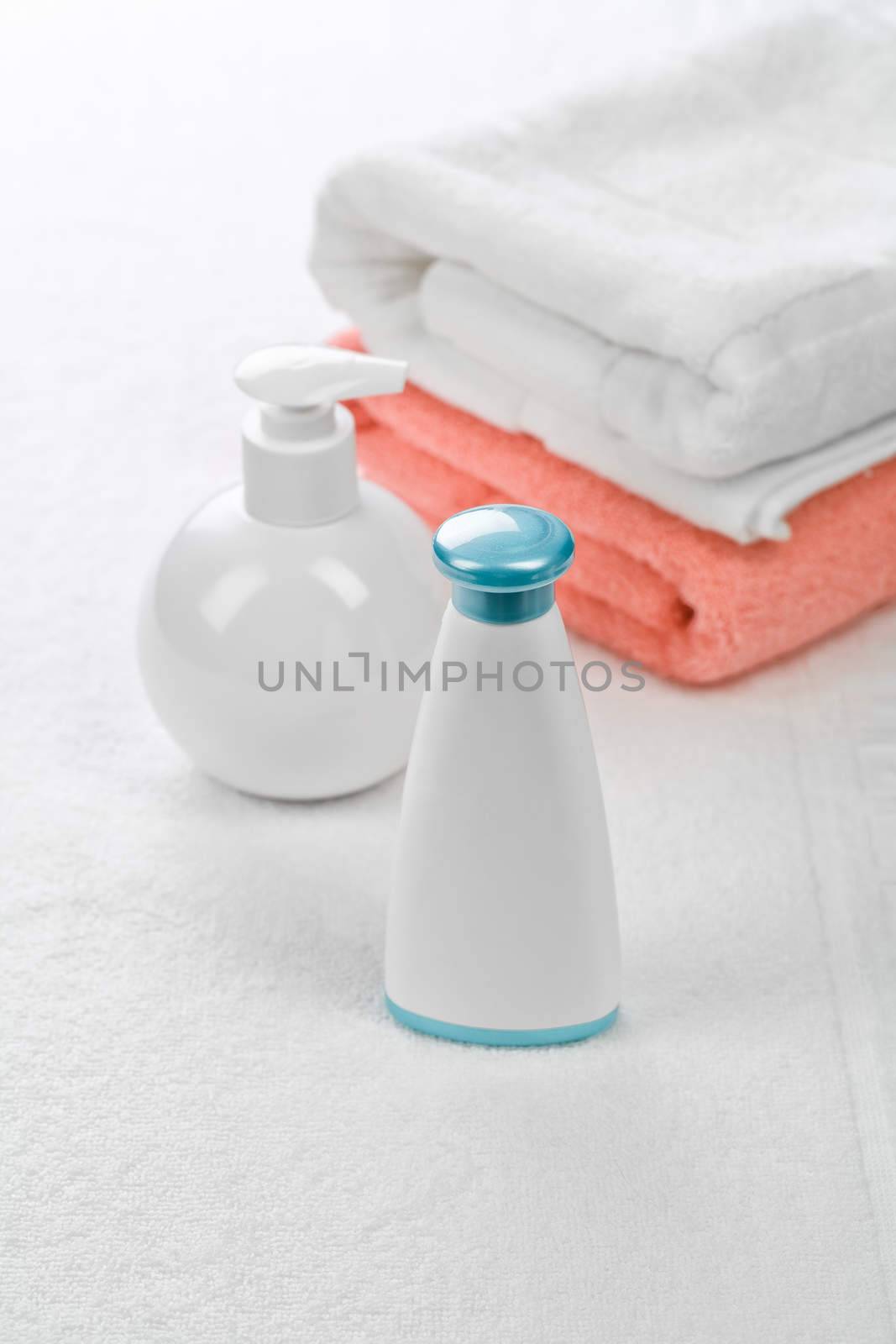 bottles with two towels